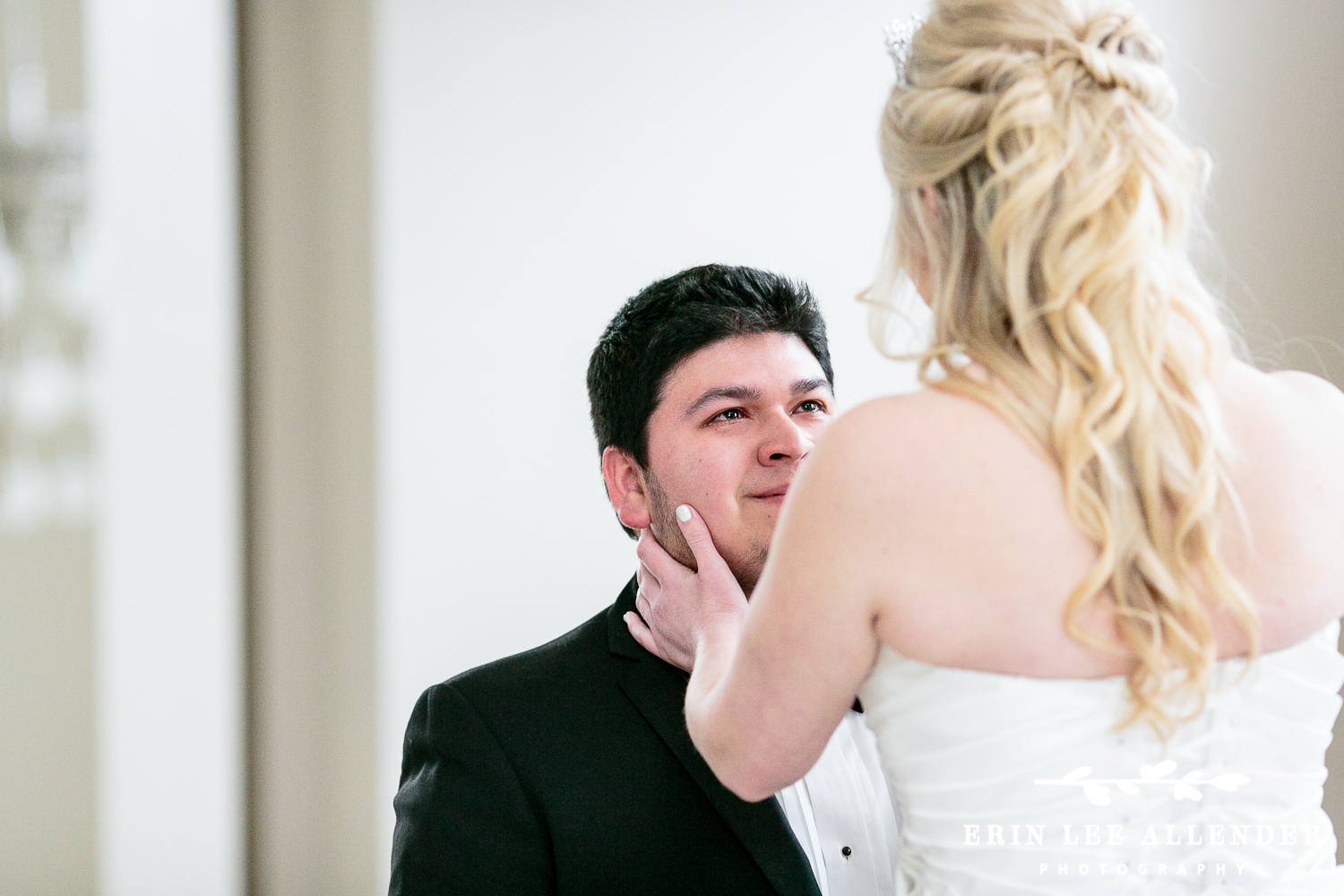 Groom cries during first look