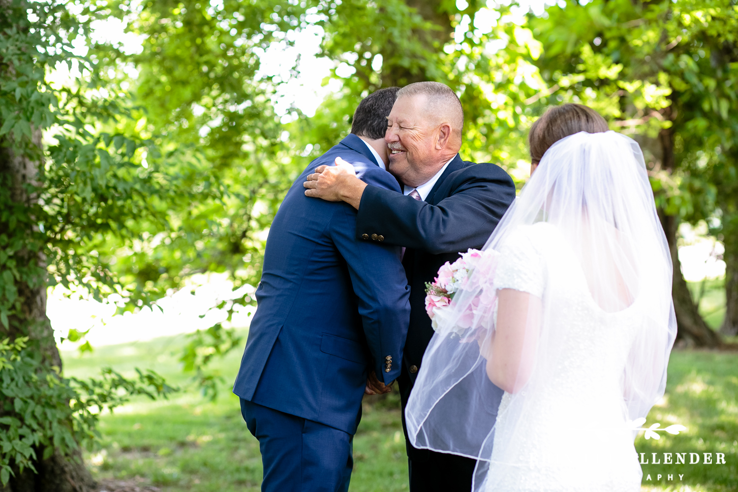 Groom_Hugs_Bride