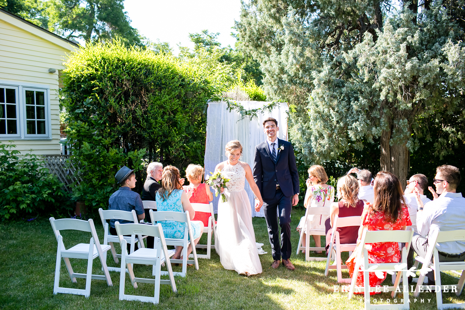 Bride_Groom_Walk_Down_Aisle