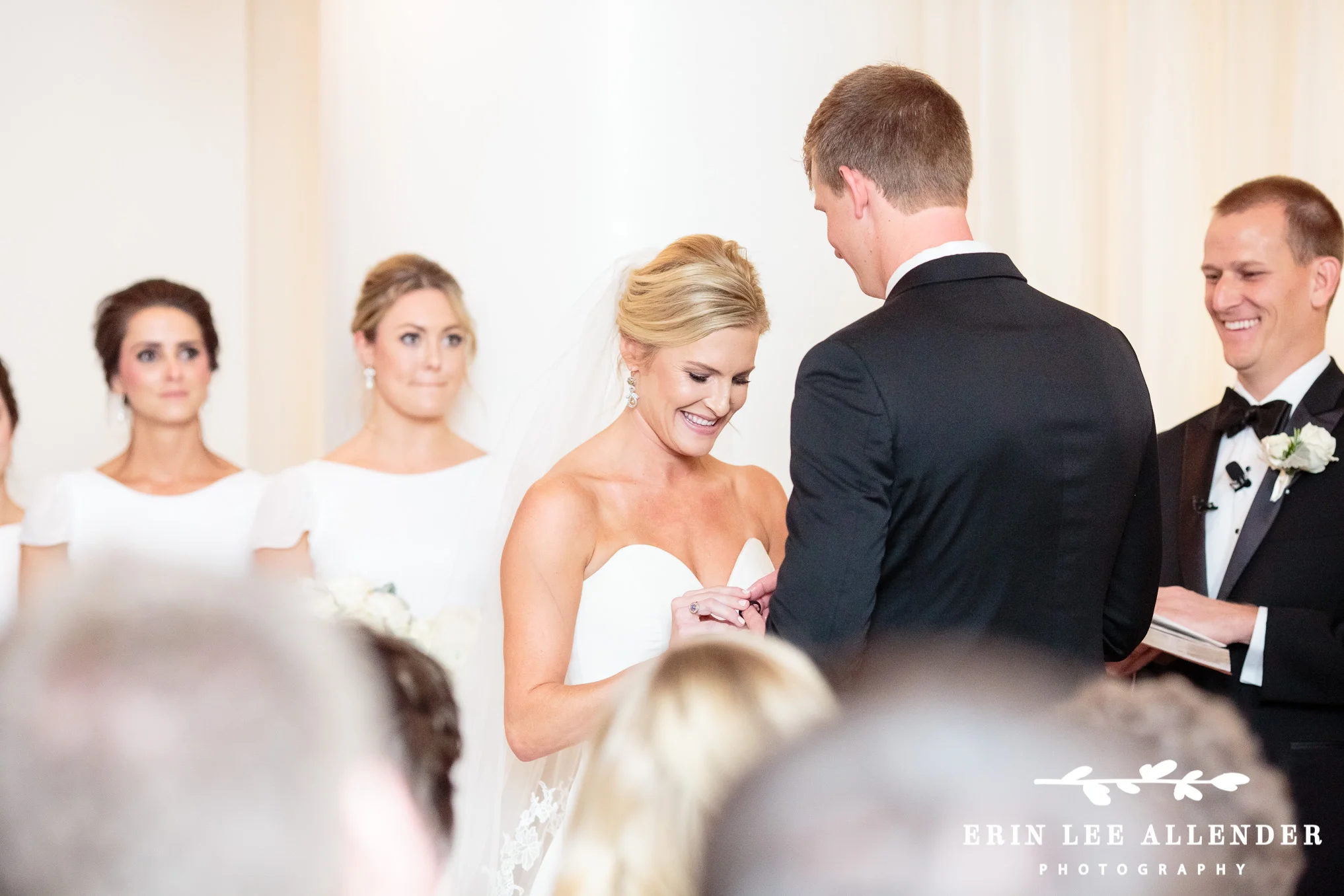 Bride_Puts_Ring_on_Grooms_Finger