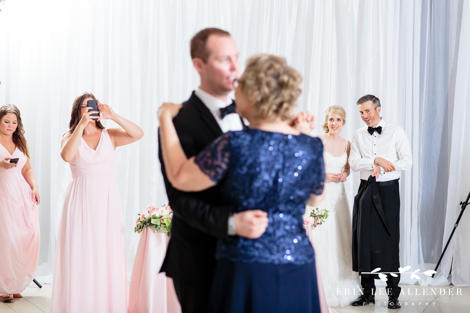 Bride_Watches_Groom_Dance_With_Mom