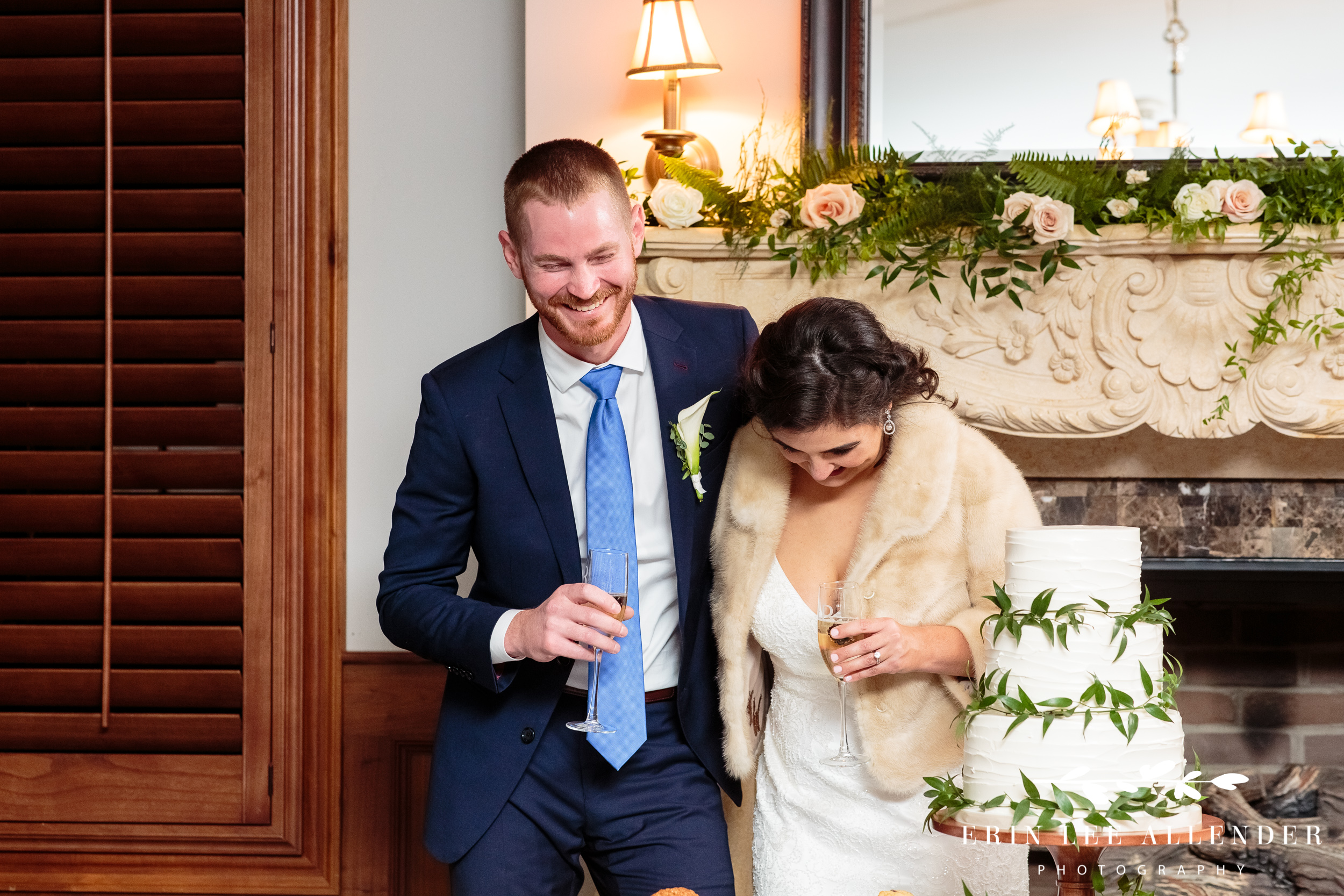 Couple-laughs-at-wedding-toast
