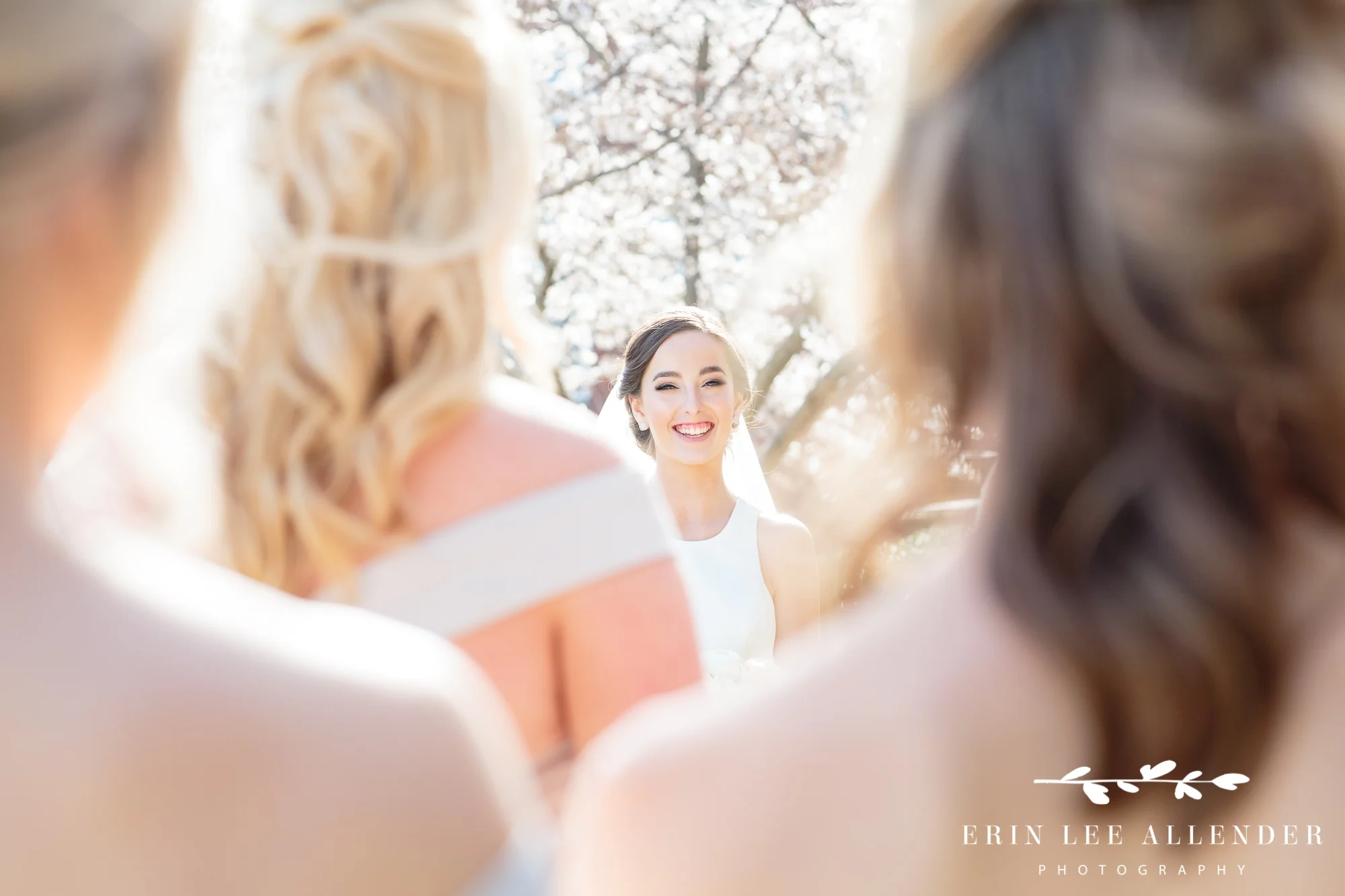 bride-looking-at-bridesmaids