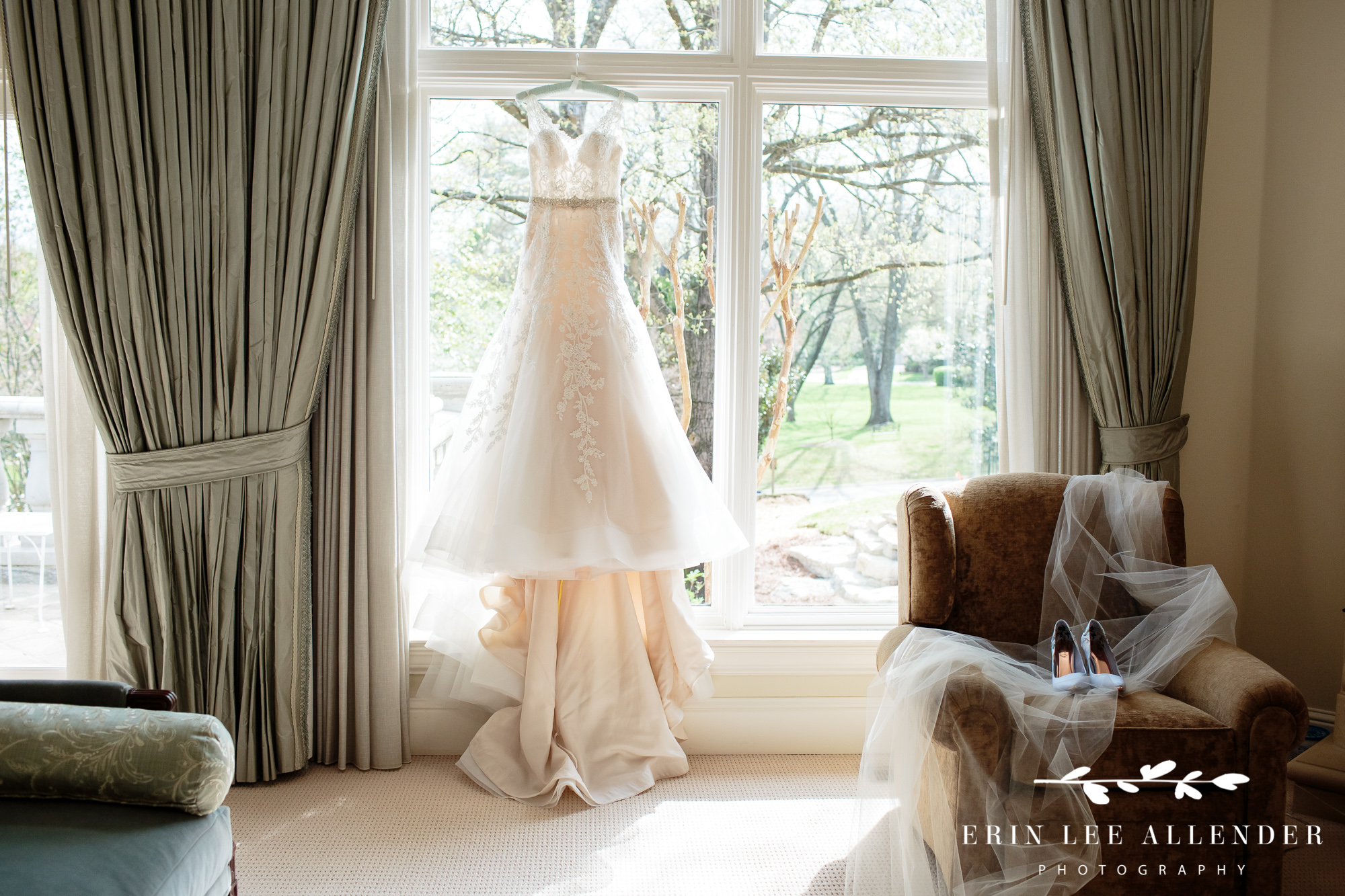 Wedding-gown-hanging-in-window