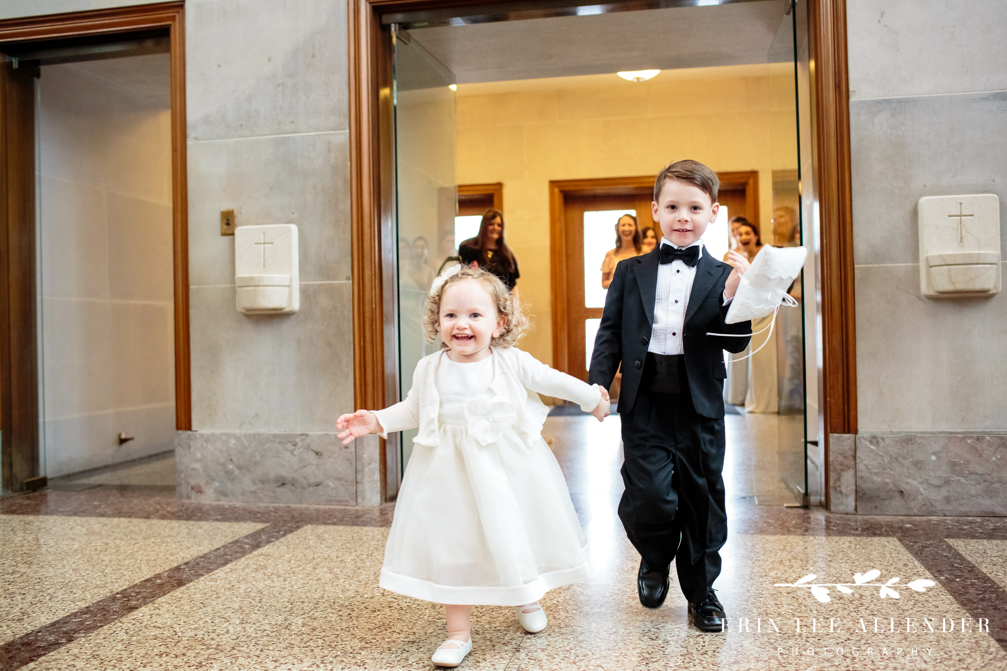 ring-bearer-flower-girl-run-down-aisle