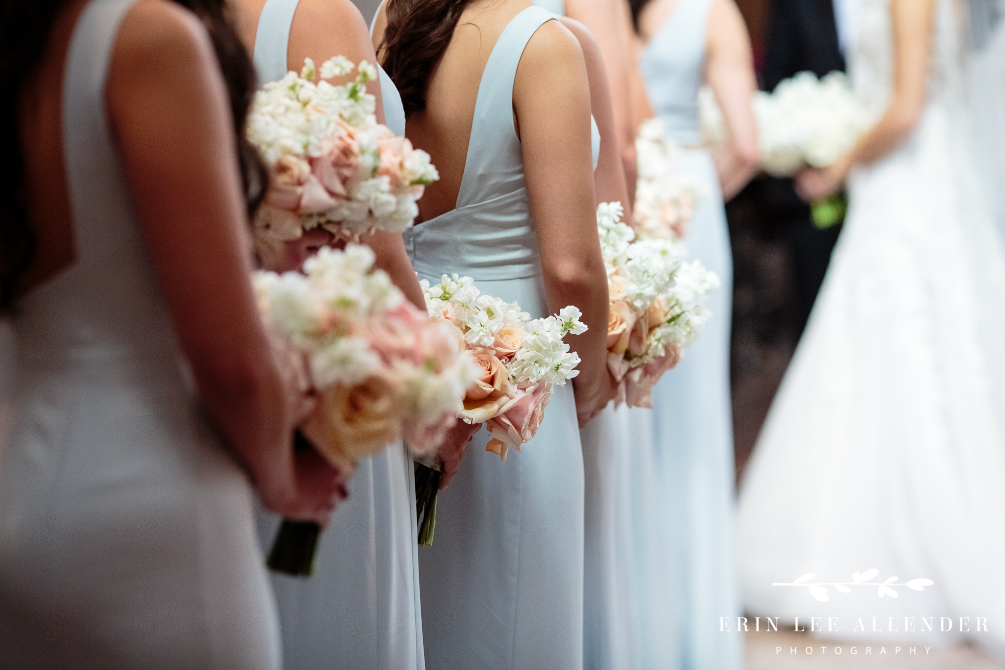 bridesmaids-holding-flowers