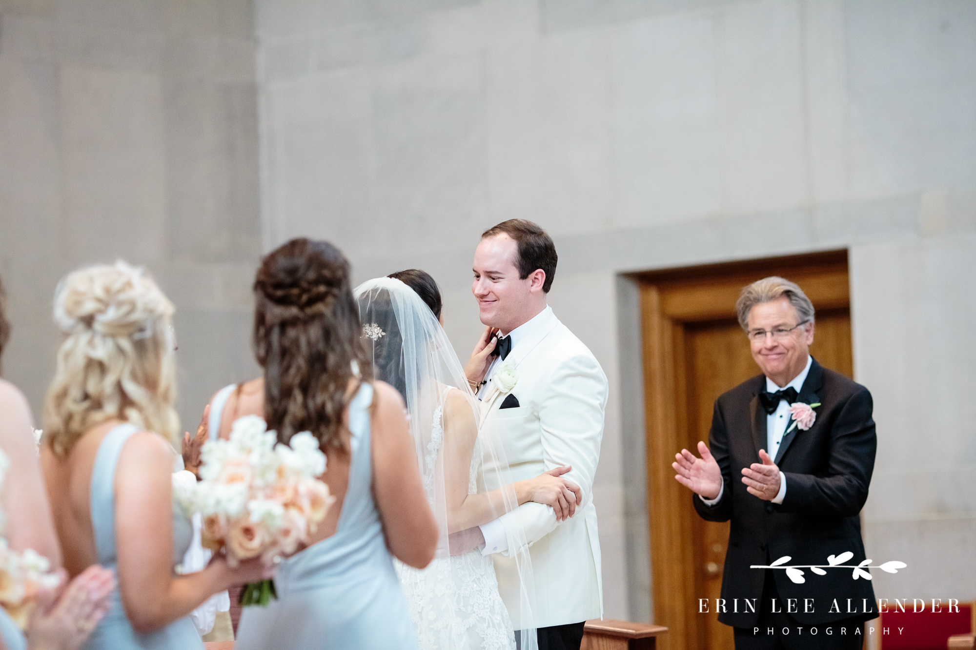 groom-looks-at bride-post-kiss