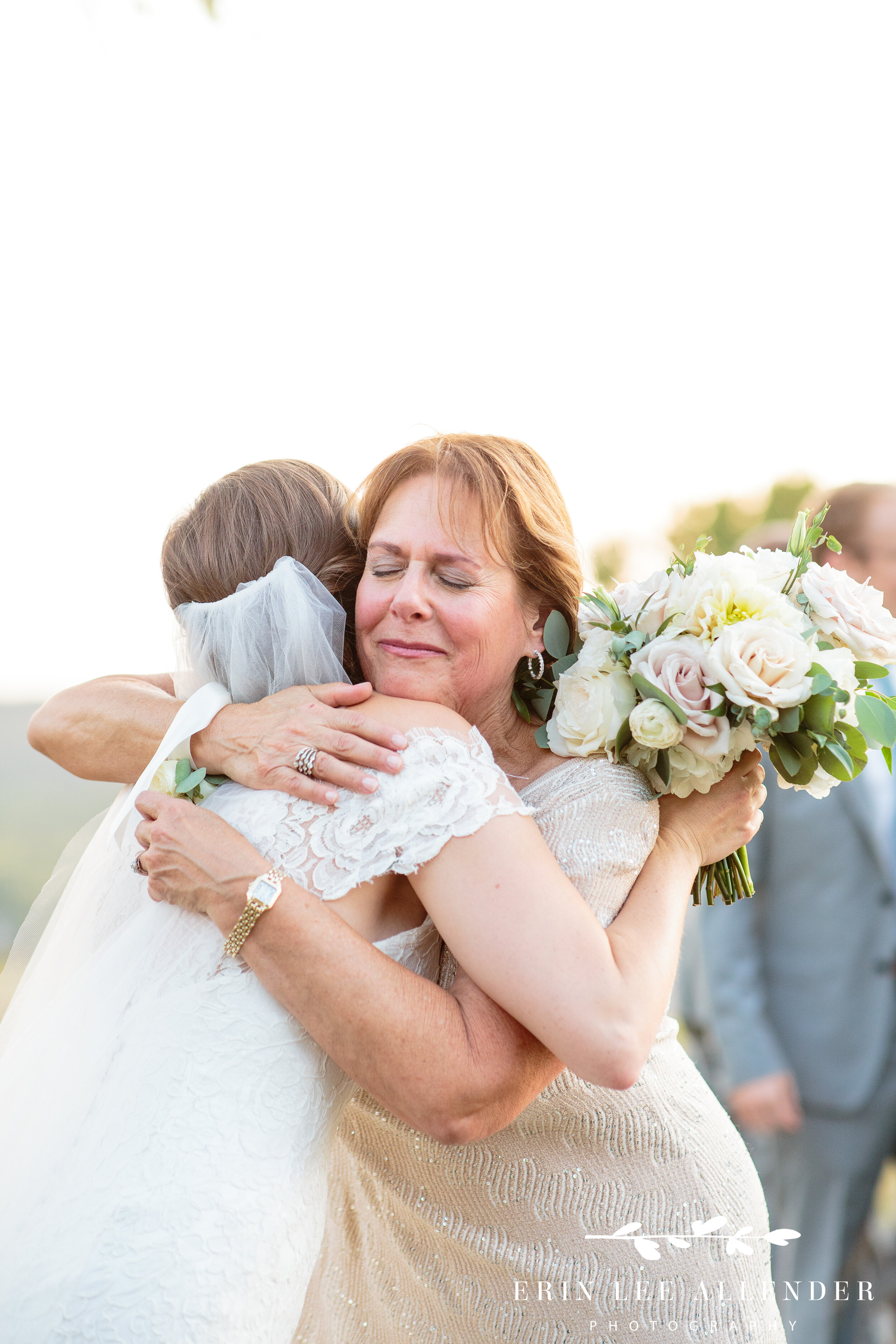 Mother-in-law-hugs-bride