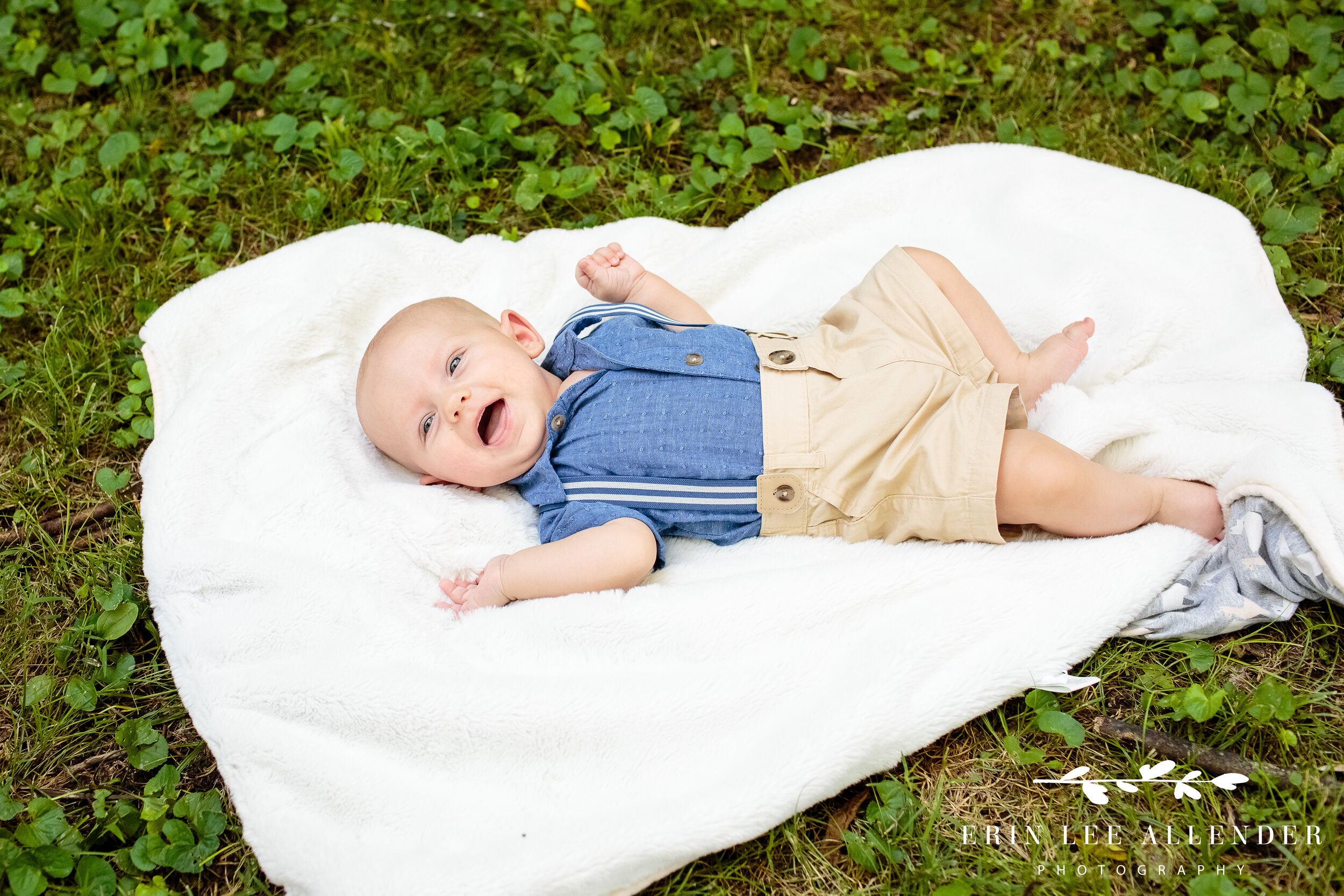 baby-laughing-on-blanket