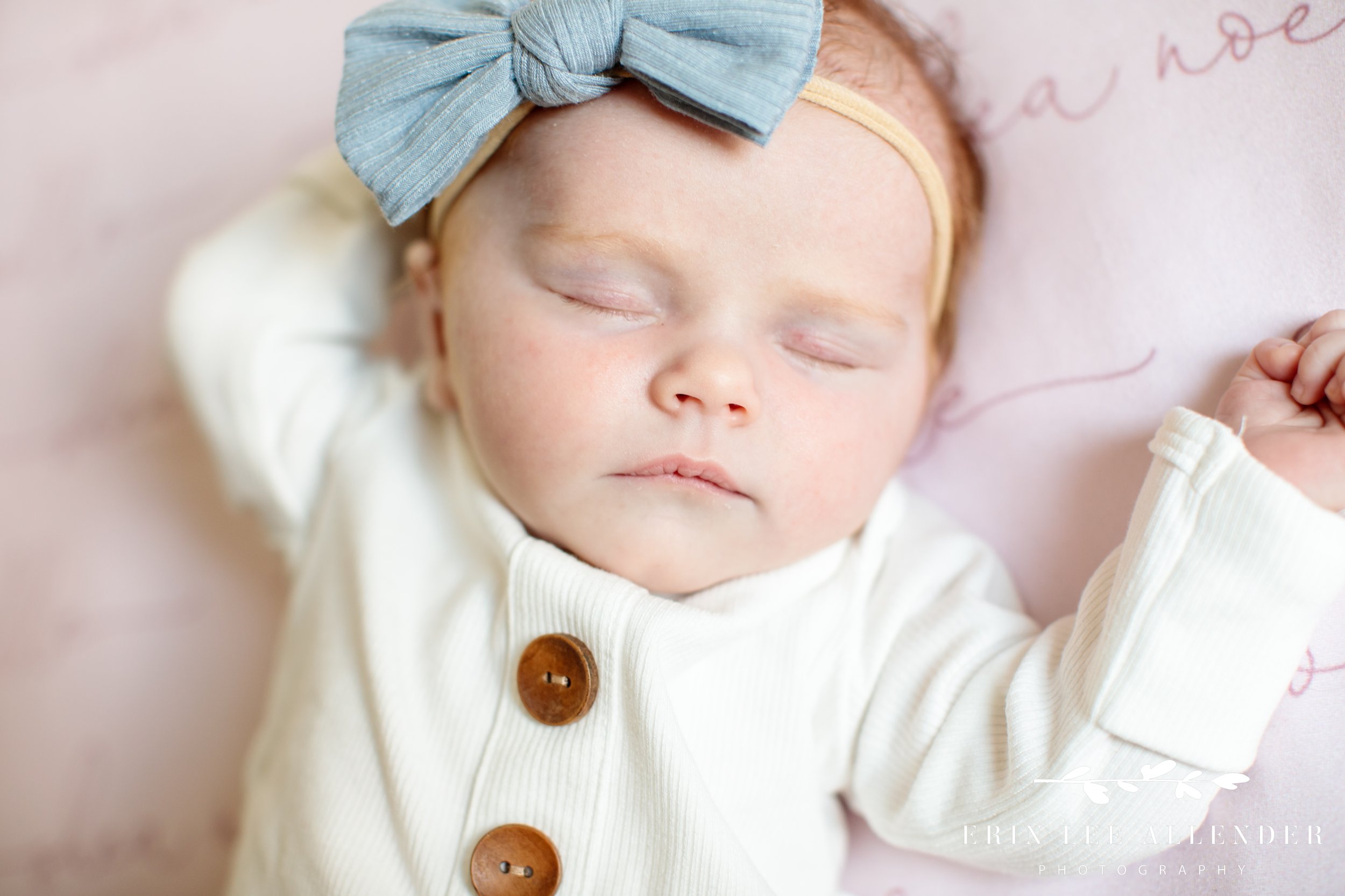 newborn-with-a-bow