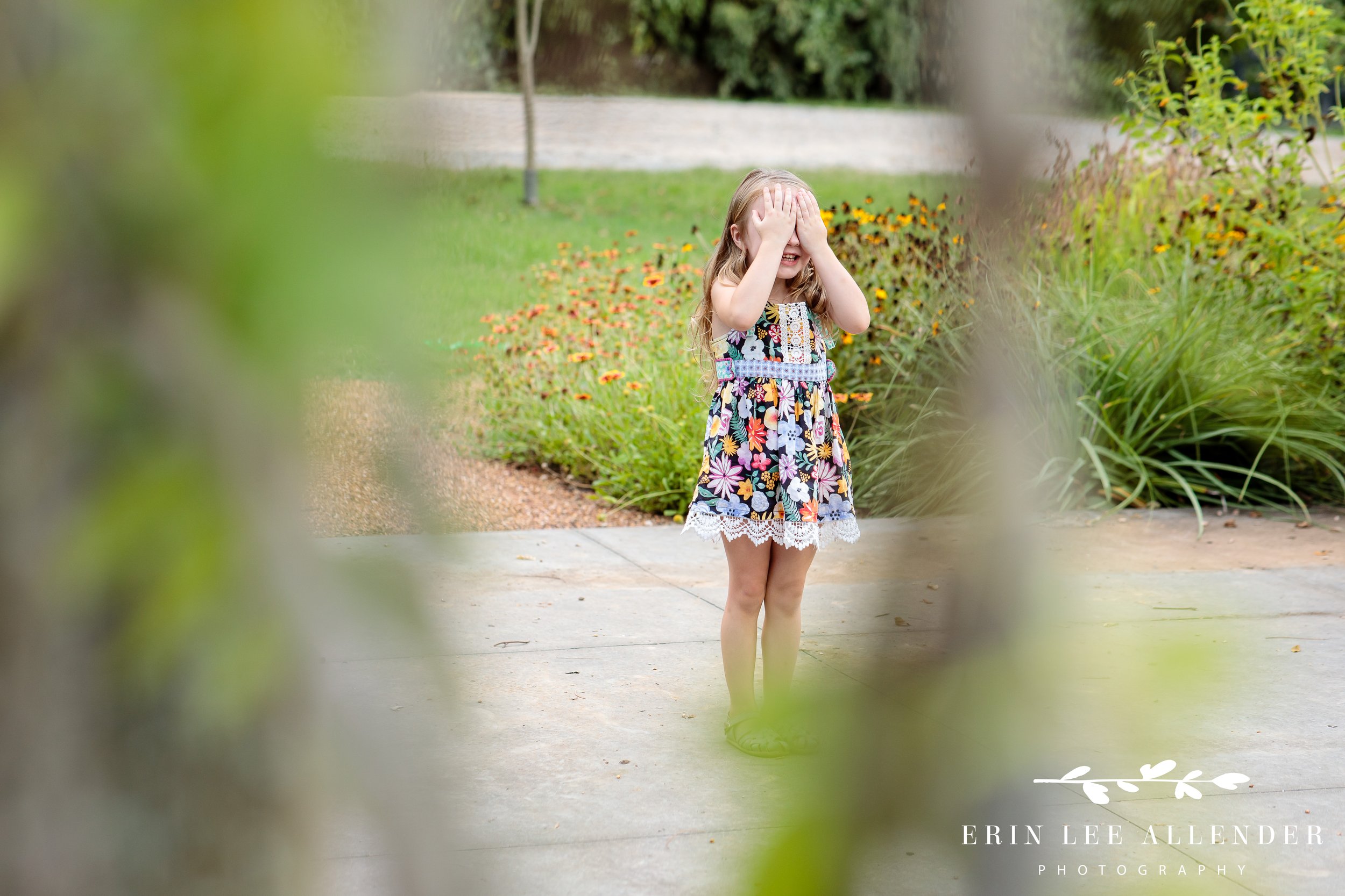 Little-girl-playing-Hide-and-seek