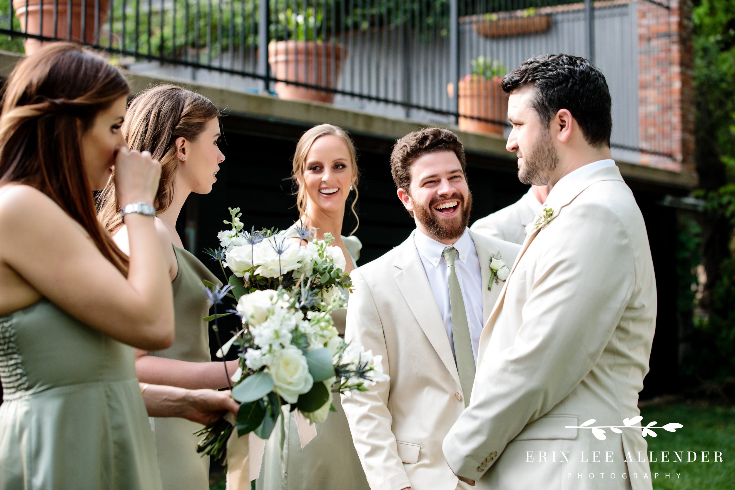 bridal-party-congratulates-couple 