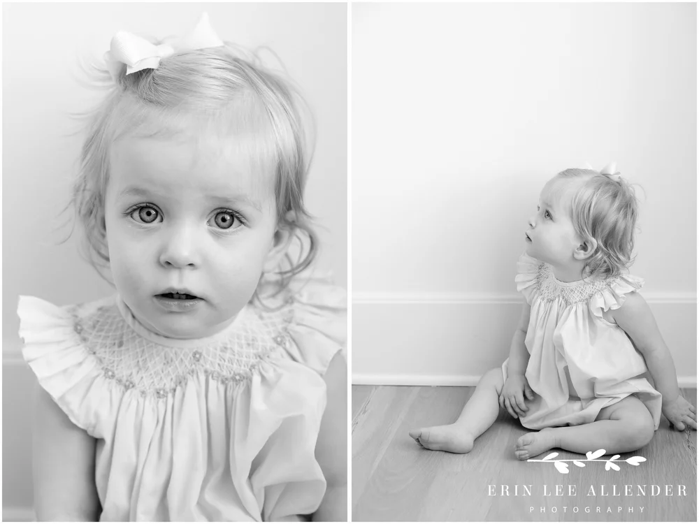 Close-up black-and-white portrait of one-year-old girl with expressive eyes, Nashville baby photography