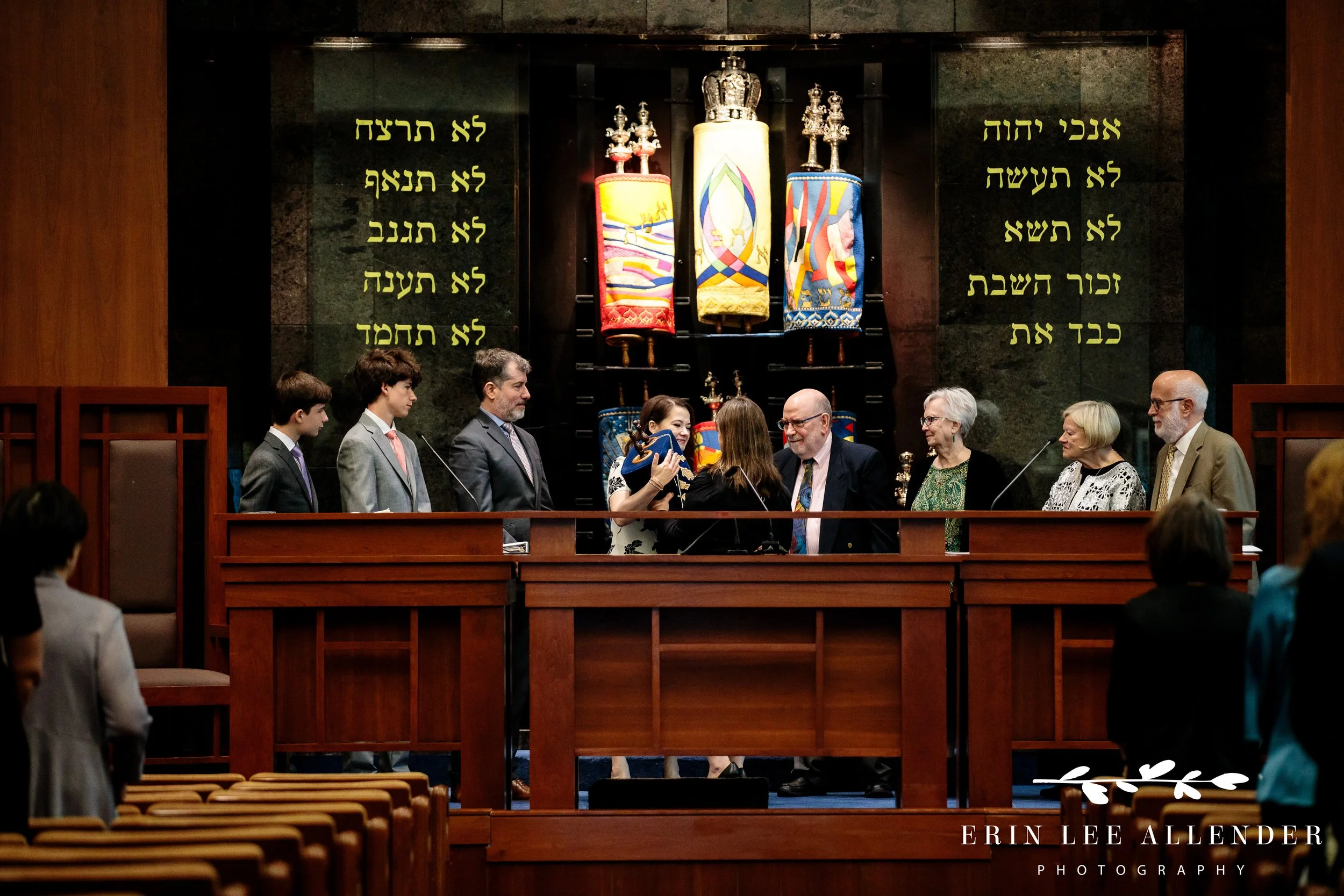 Family passing the Torah during Bar Mitzvah service at The Temple Nashville.