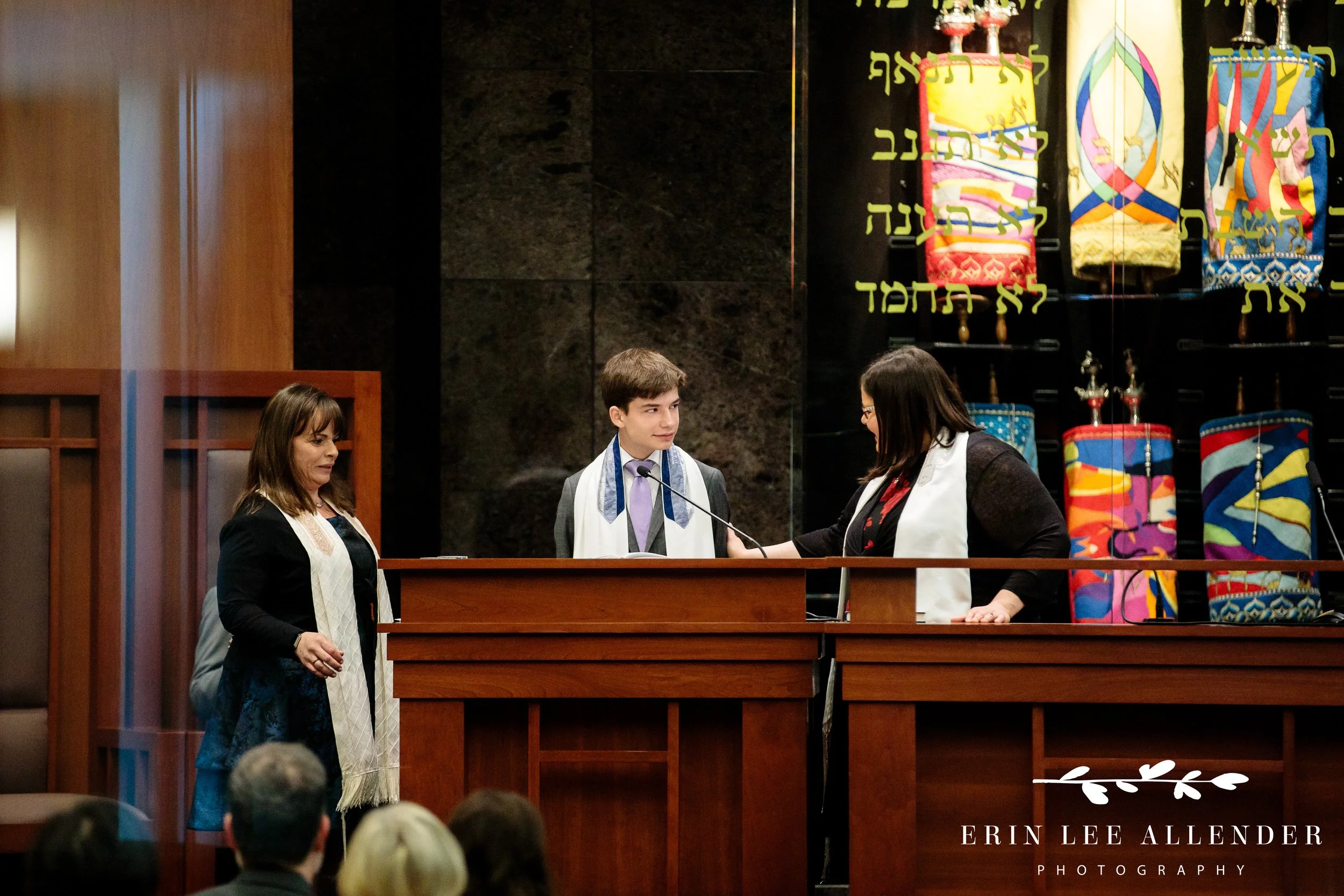 Rabbi and cantor congratulating Simon as he becomes a Bar Mitzvah at The Temple Nashville.