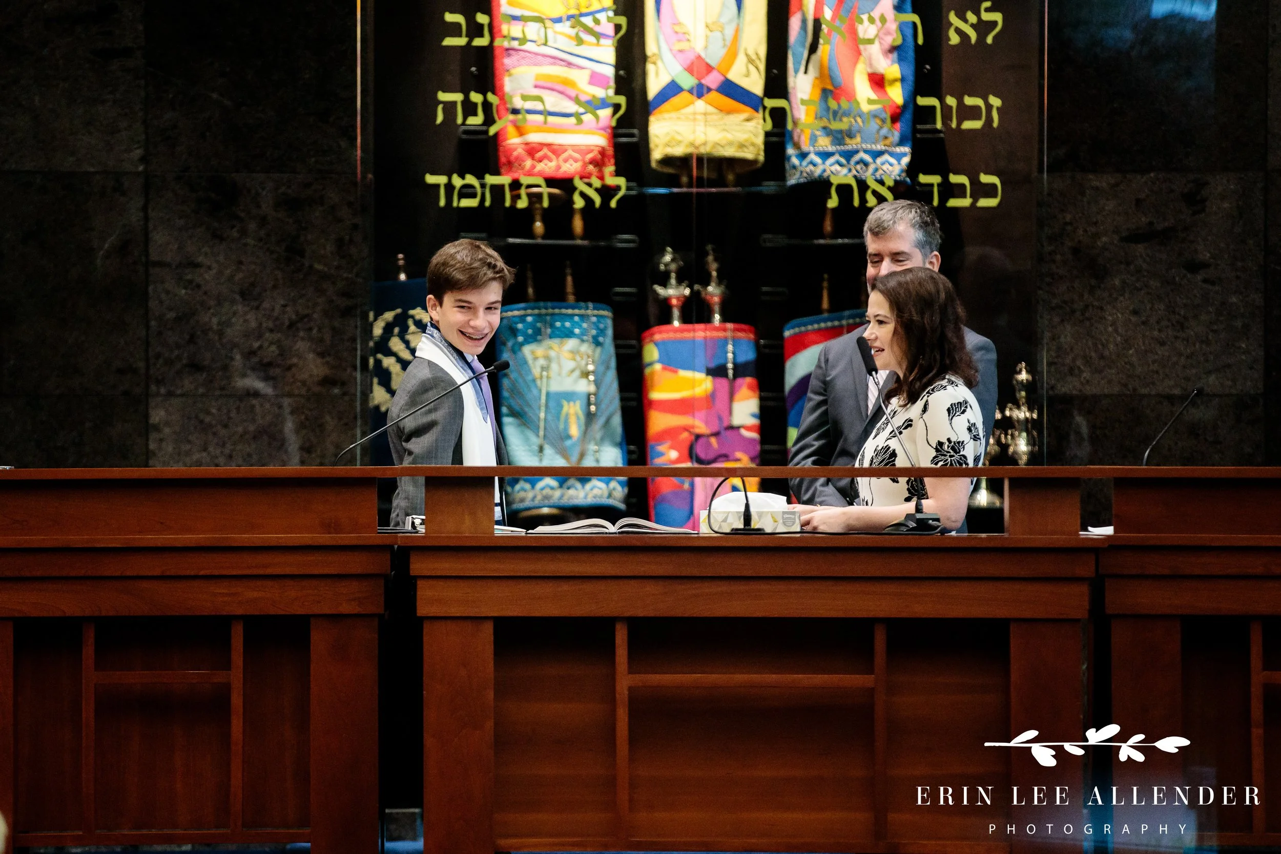 Parents giving blessings to Bar Mitzvah son during service at The Temple Nashville.
