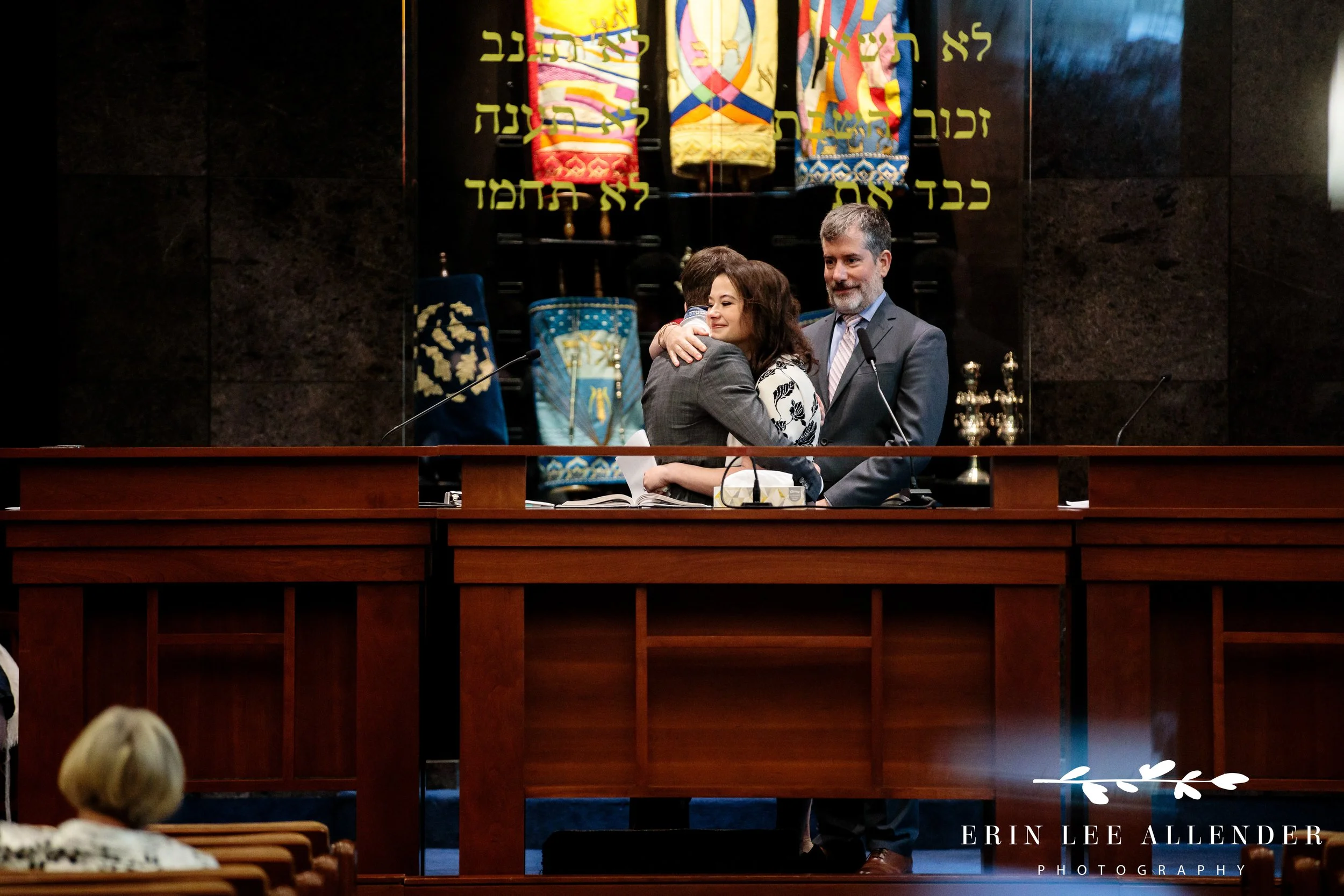 Mother hugging Bar Mitzvah boy at The Temple in Nashville.