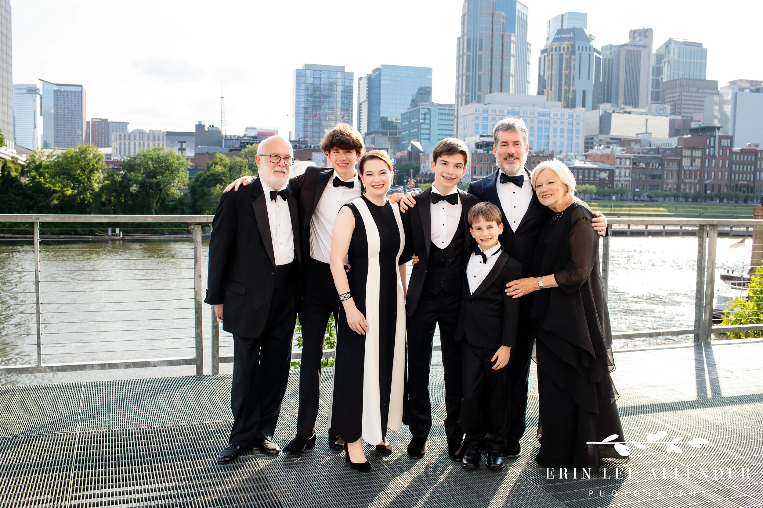 Extended family portrait with downtown Nashville skyline at The Bridge Building Bar Mitzvah.