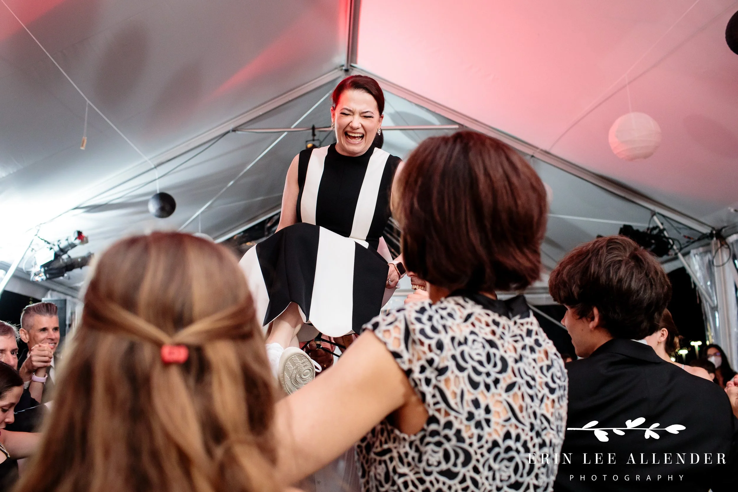 Mother lifted in chair during horah at The Bridge Building Nashville Bar Mitzvah.