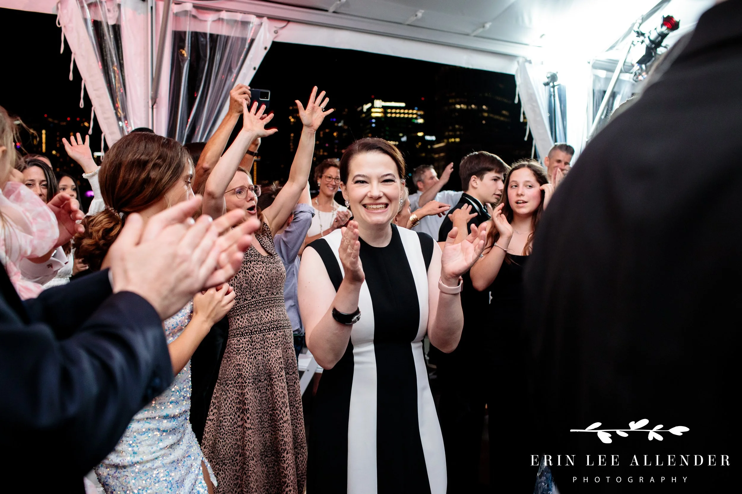 Mother dancing at rooftop tent during Nashville Bar Mitzvah at The Bridge Building.