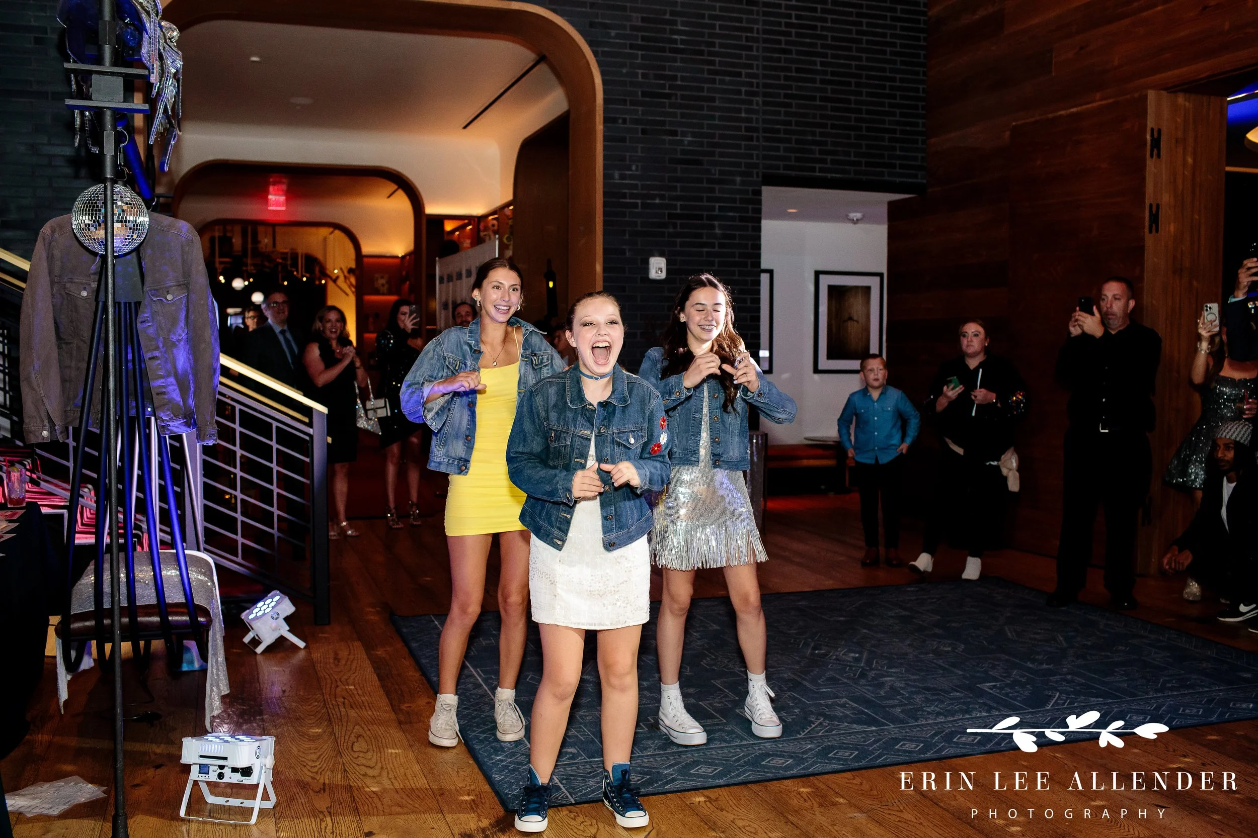 Bat Mitzvah girl dancing with best friends during party entrance at Virgin Hotel Nashville