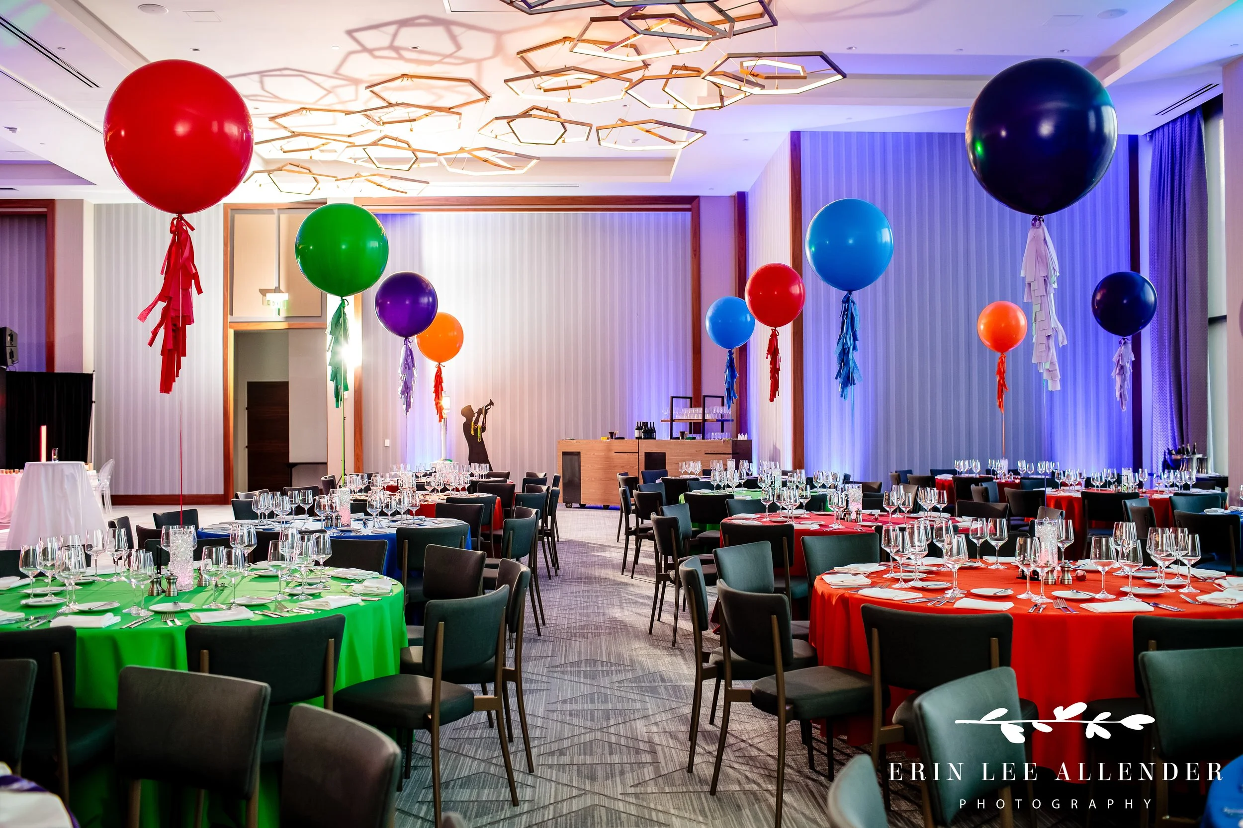 Wide shot of mitzvah party setup at Four Seasons Nashville with colorful linens and balloons