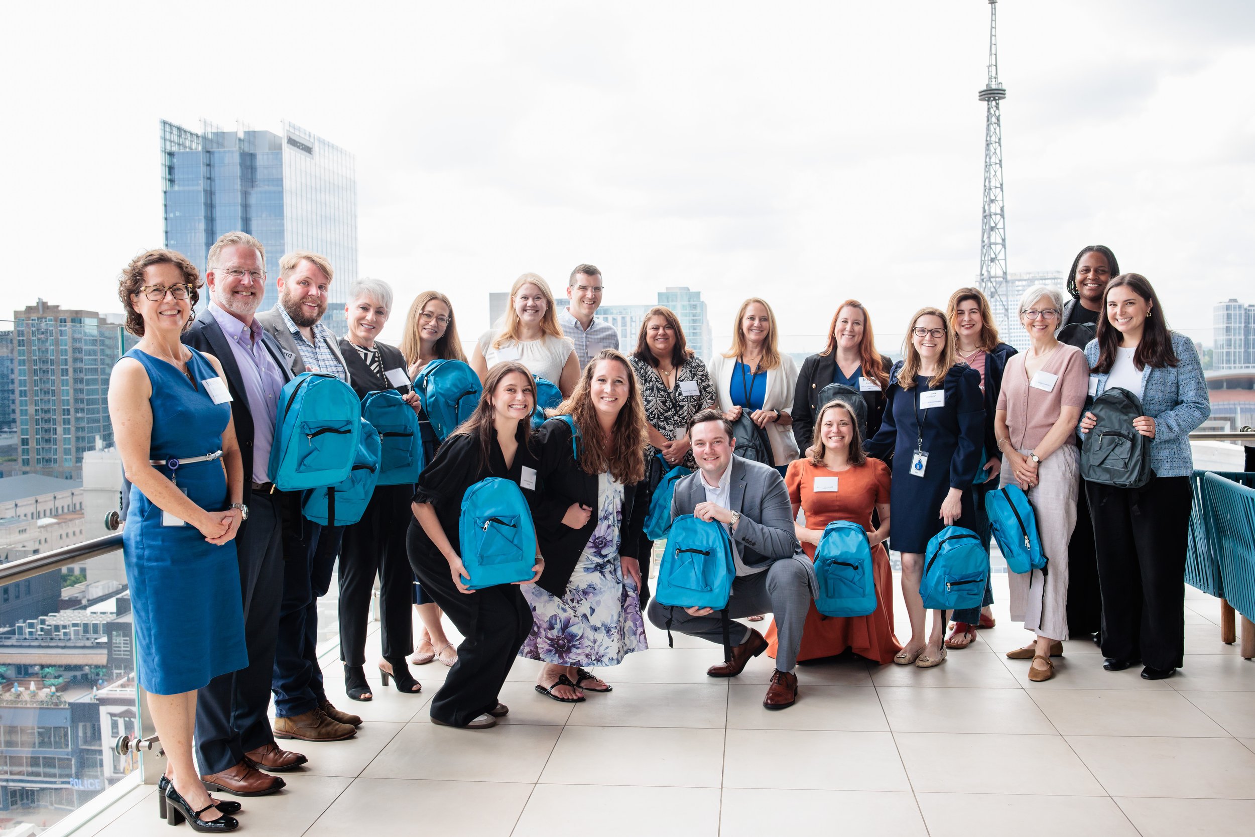 Nashville Corporate Event Photography | Husch Blackwell &amp; Vanderbilt Backpack Drive for Pencil