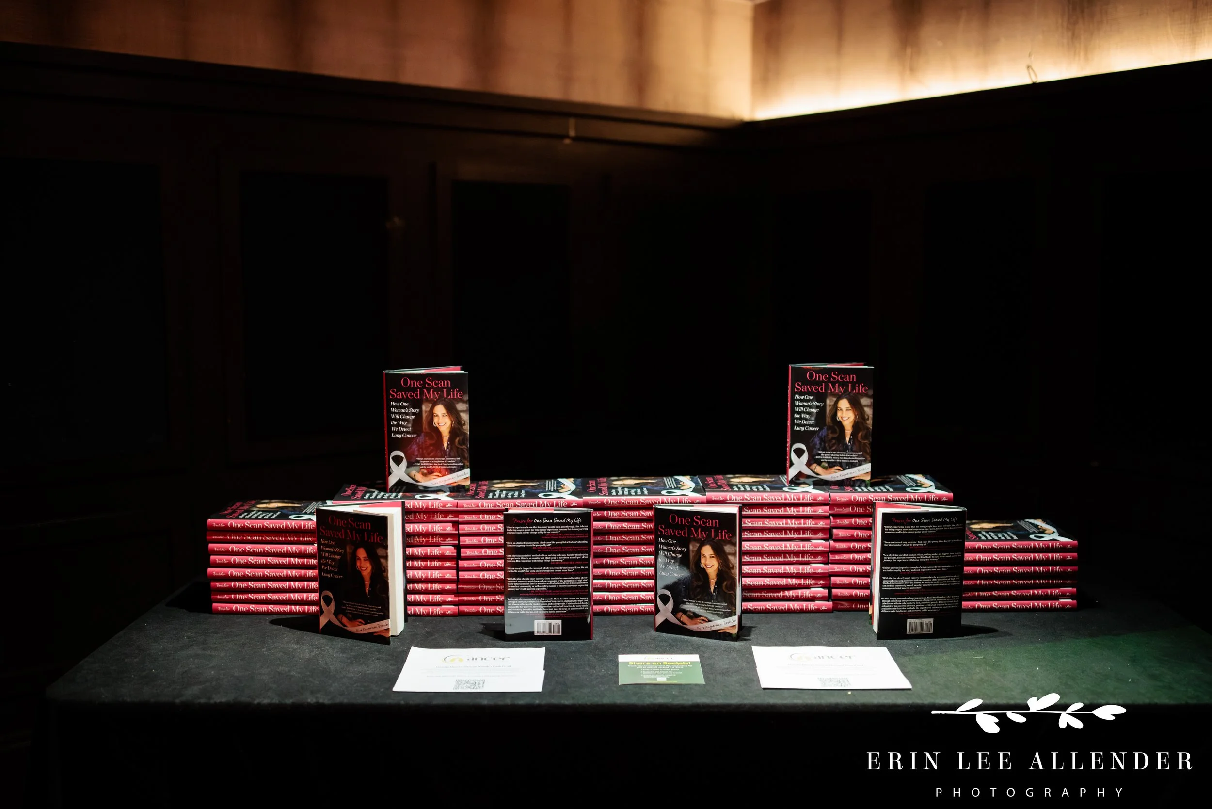 Stacks of One Scan Saved My Life books available for purchase at Hutton Hotel Analog book launch party