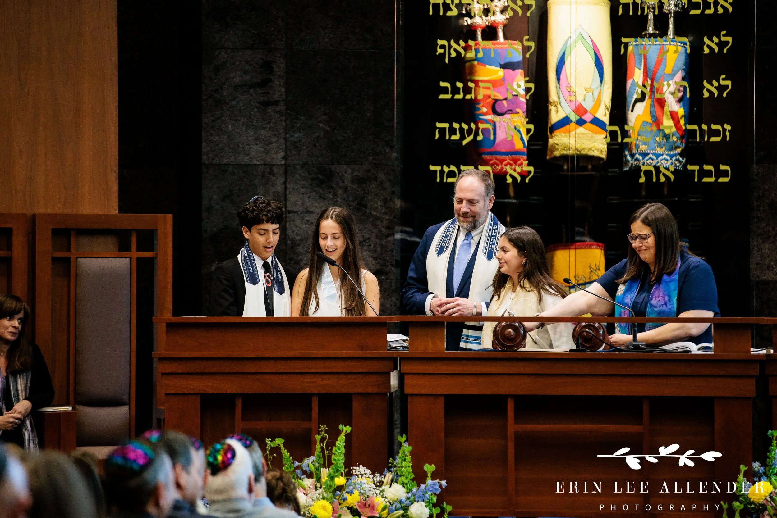 Siblings participating in aliyah