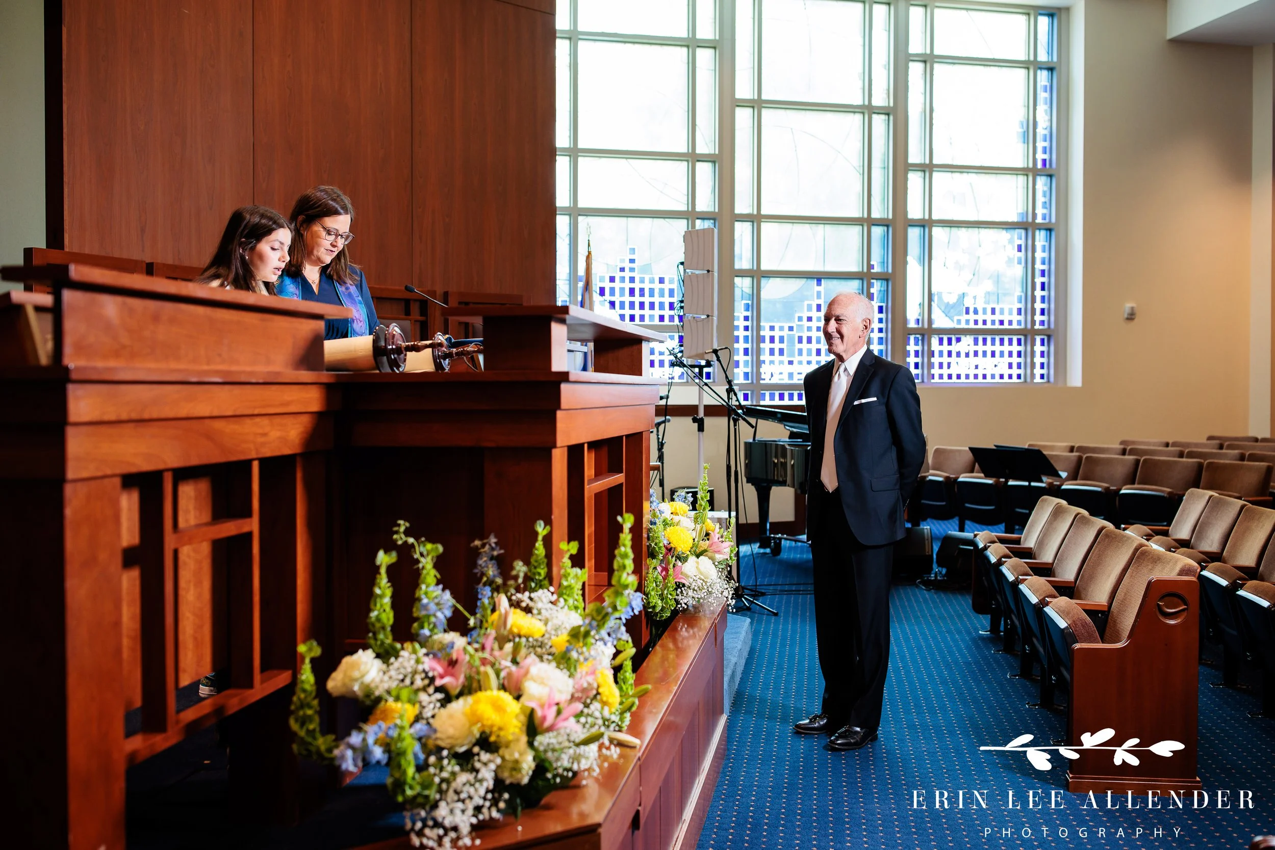 Grandfather watching Torah reading during service
