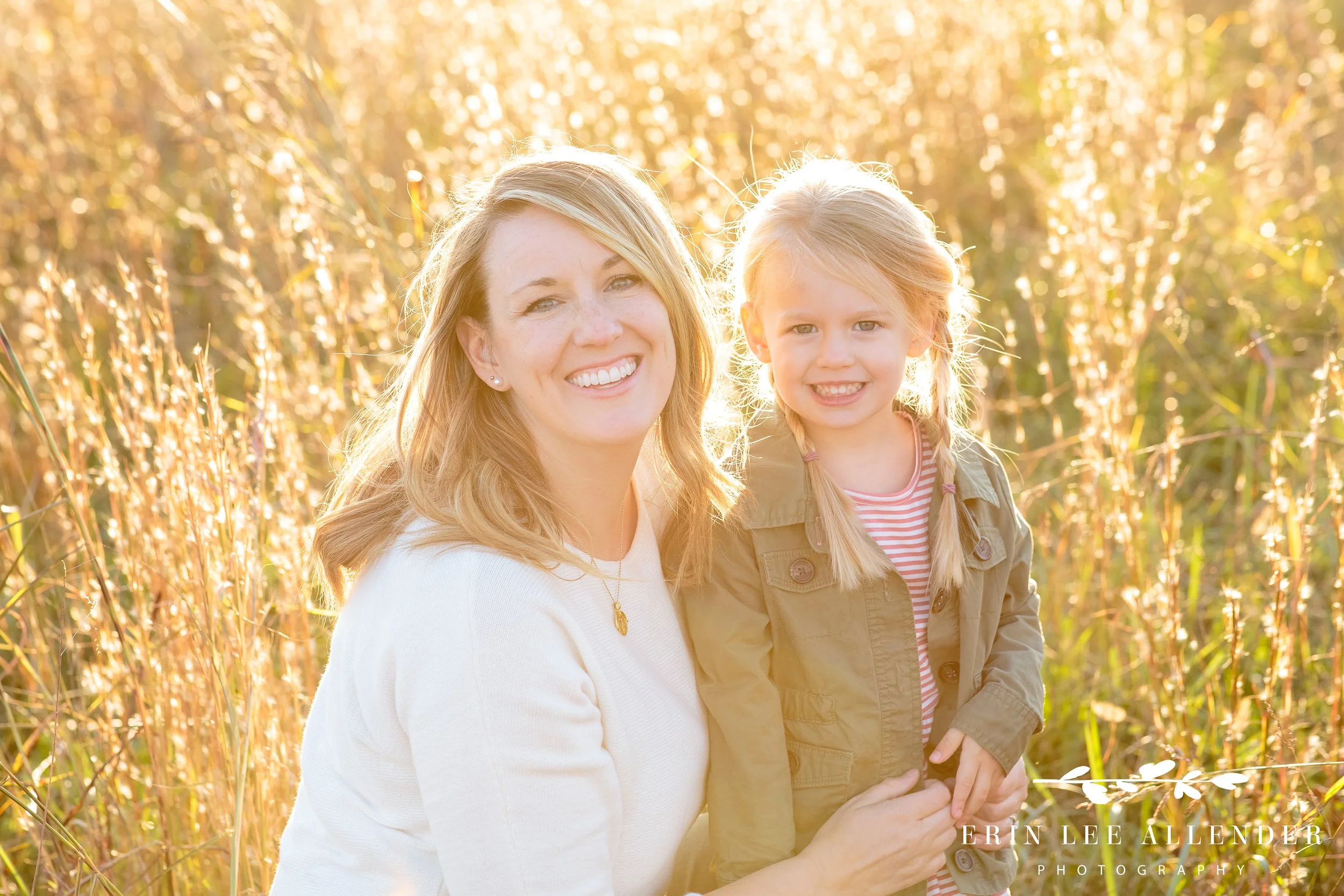 Close-up of mom and daughter smiling together in the golden light of a Gallatin family photography session.