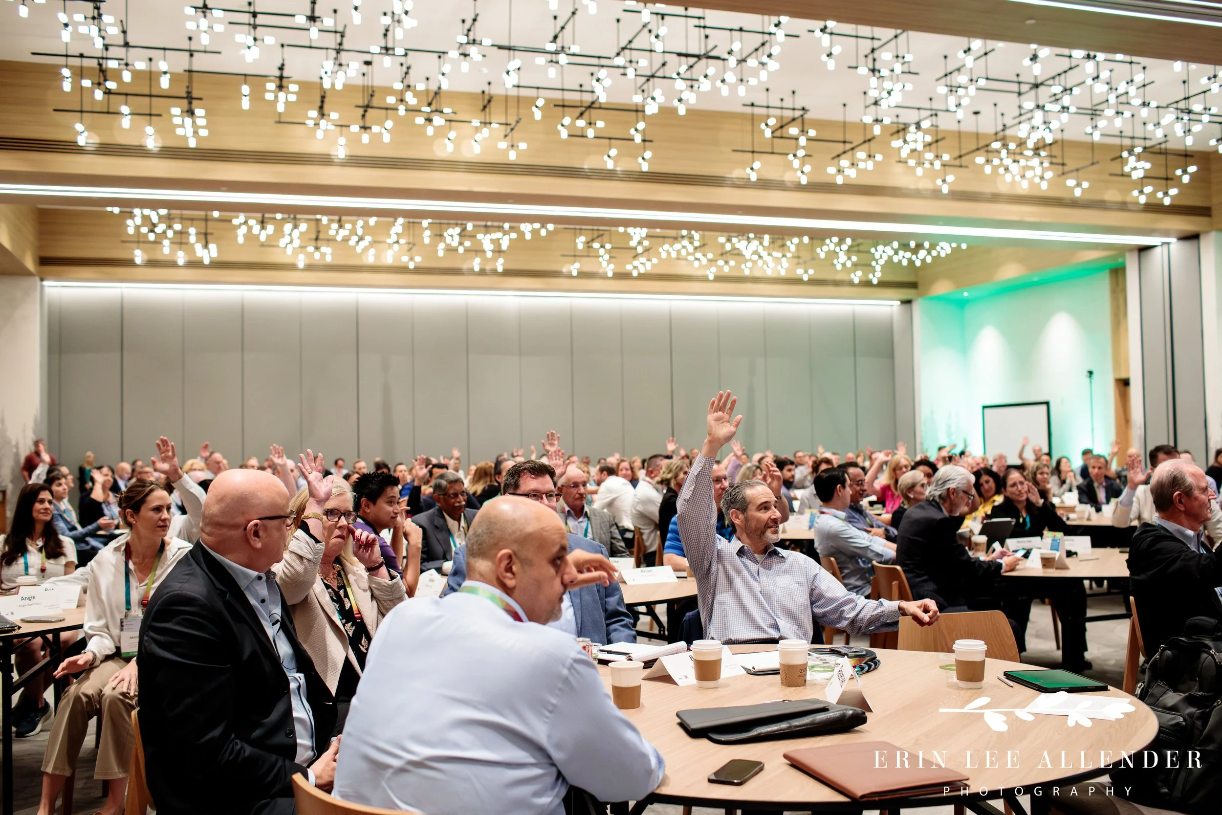 Attendee asking a question during a Nashville conference session