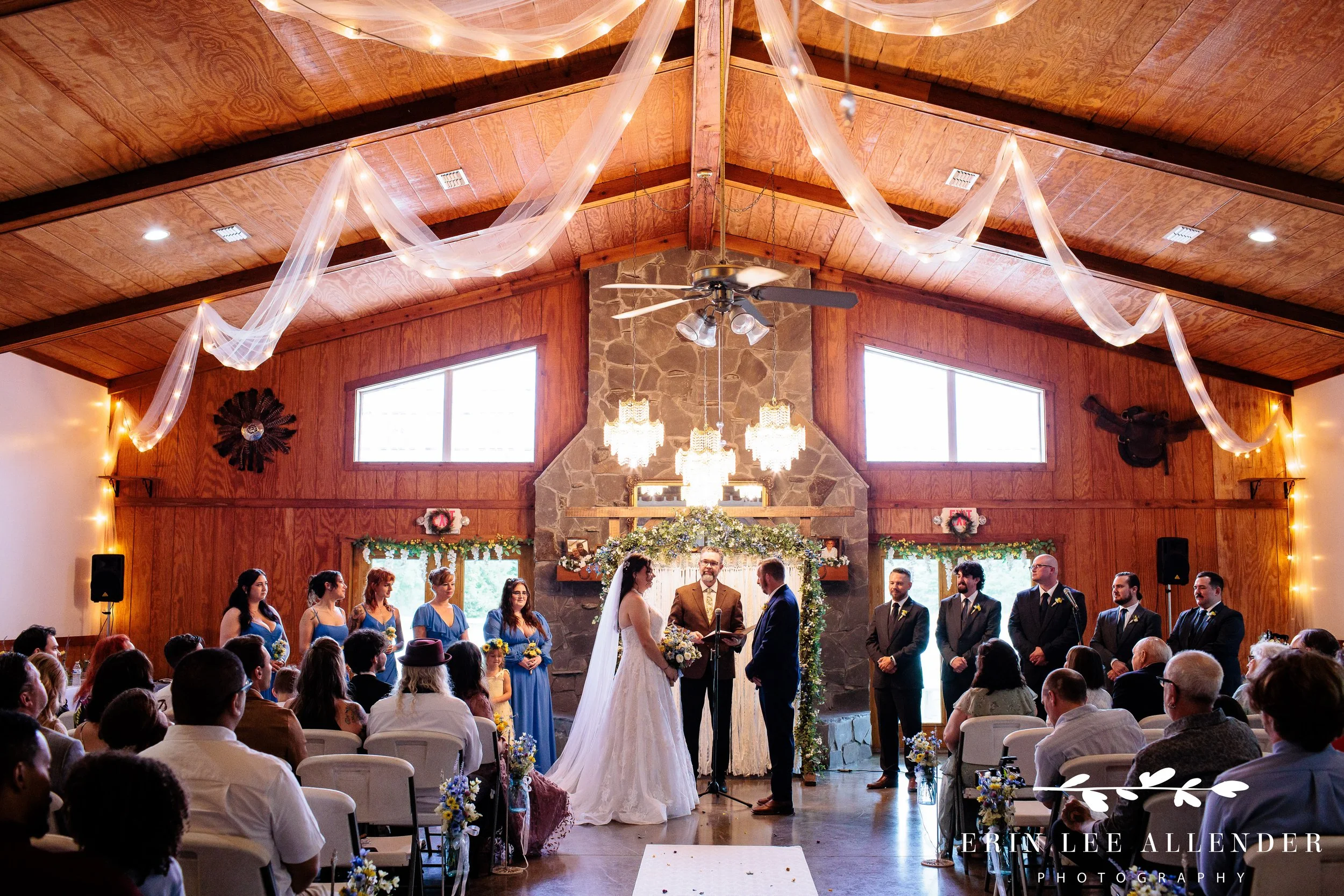 Wedding ceremony seating inside Wild Turkey Ranch during a rainy day