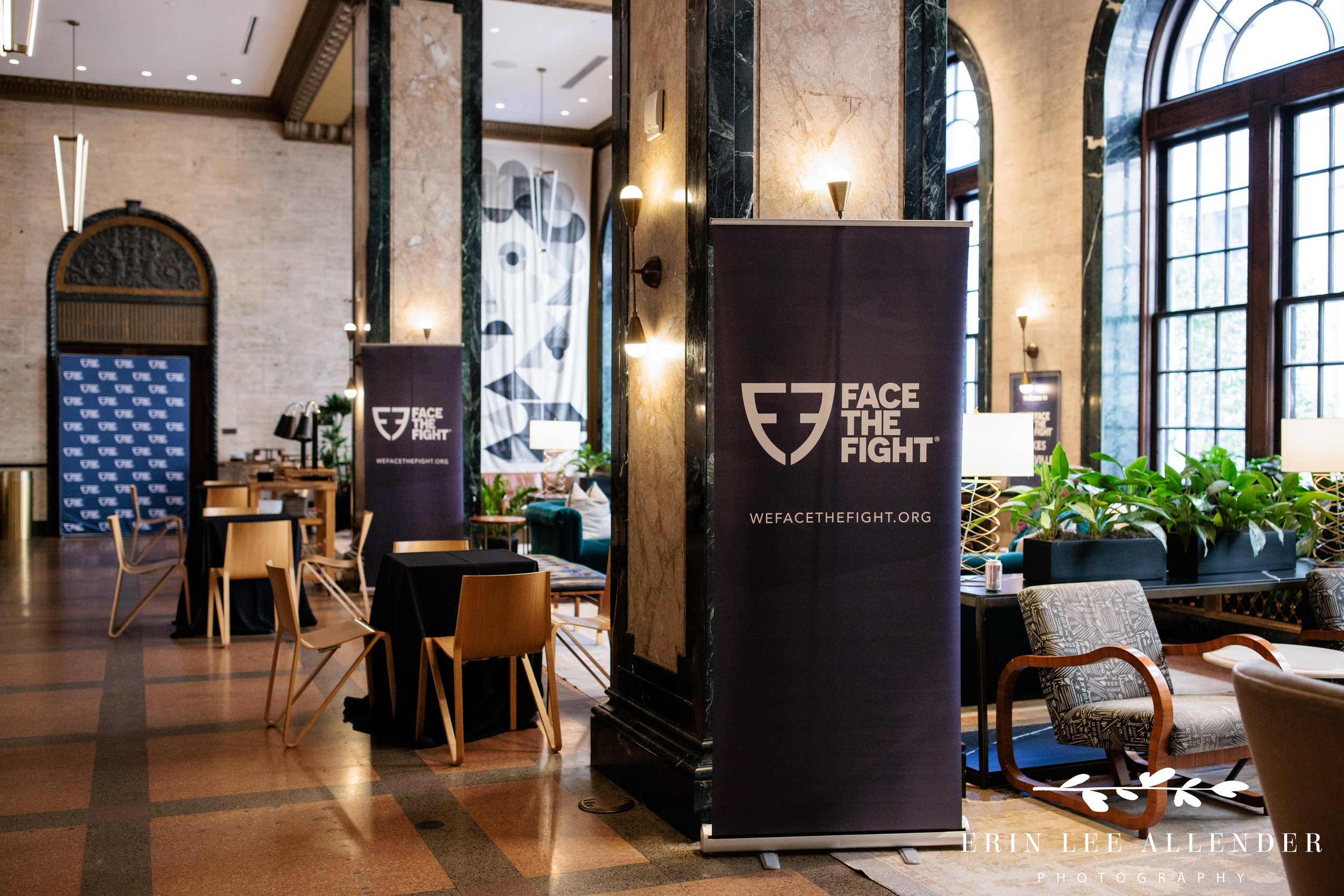 Nashville corporate event photography — Face the Fight banner in the empty event space at Noelle before opening night guests arrive