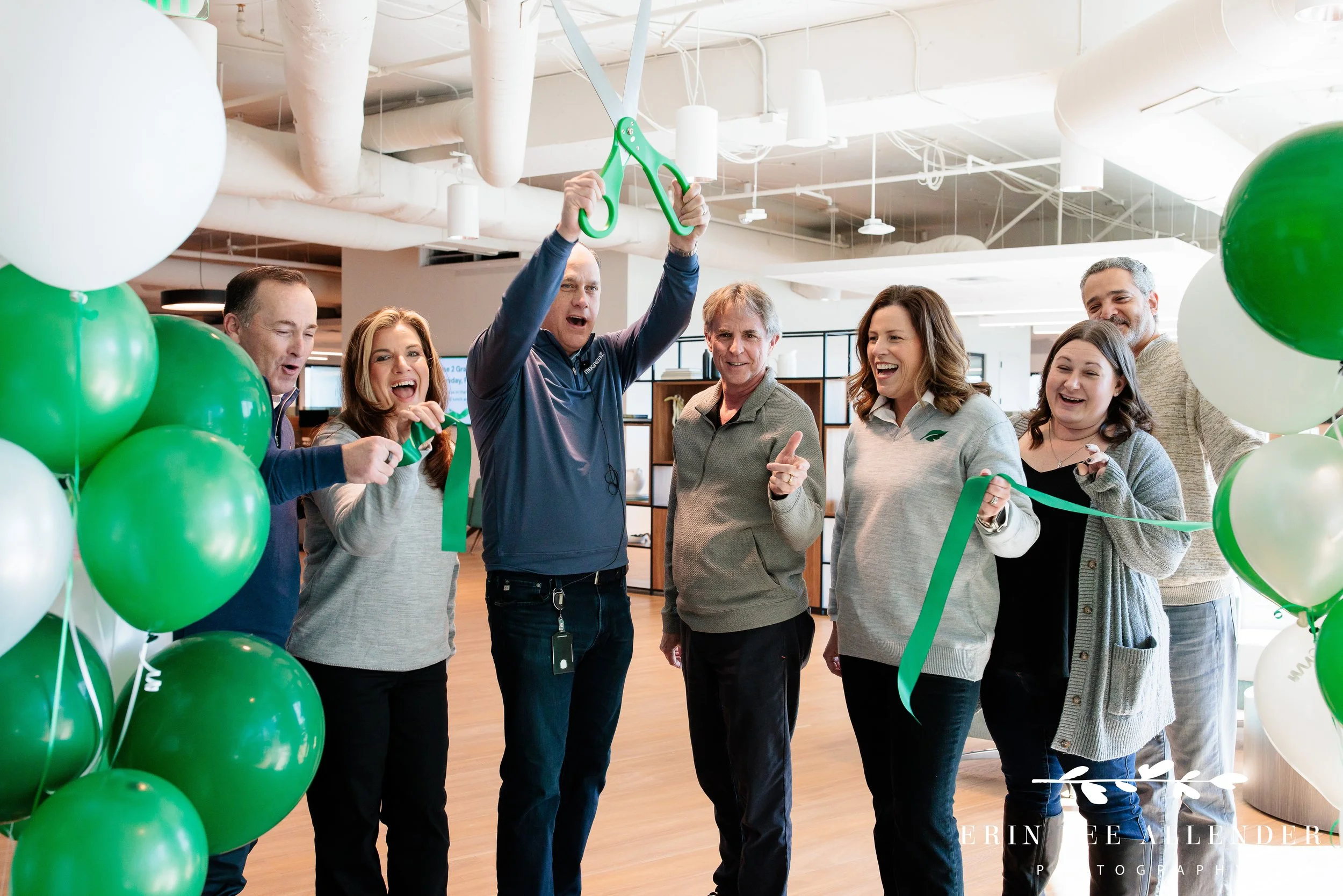 Nashville corporate event photography — staff celebrating after TruGreen ribbon cutting ceremony