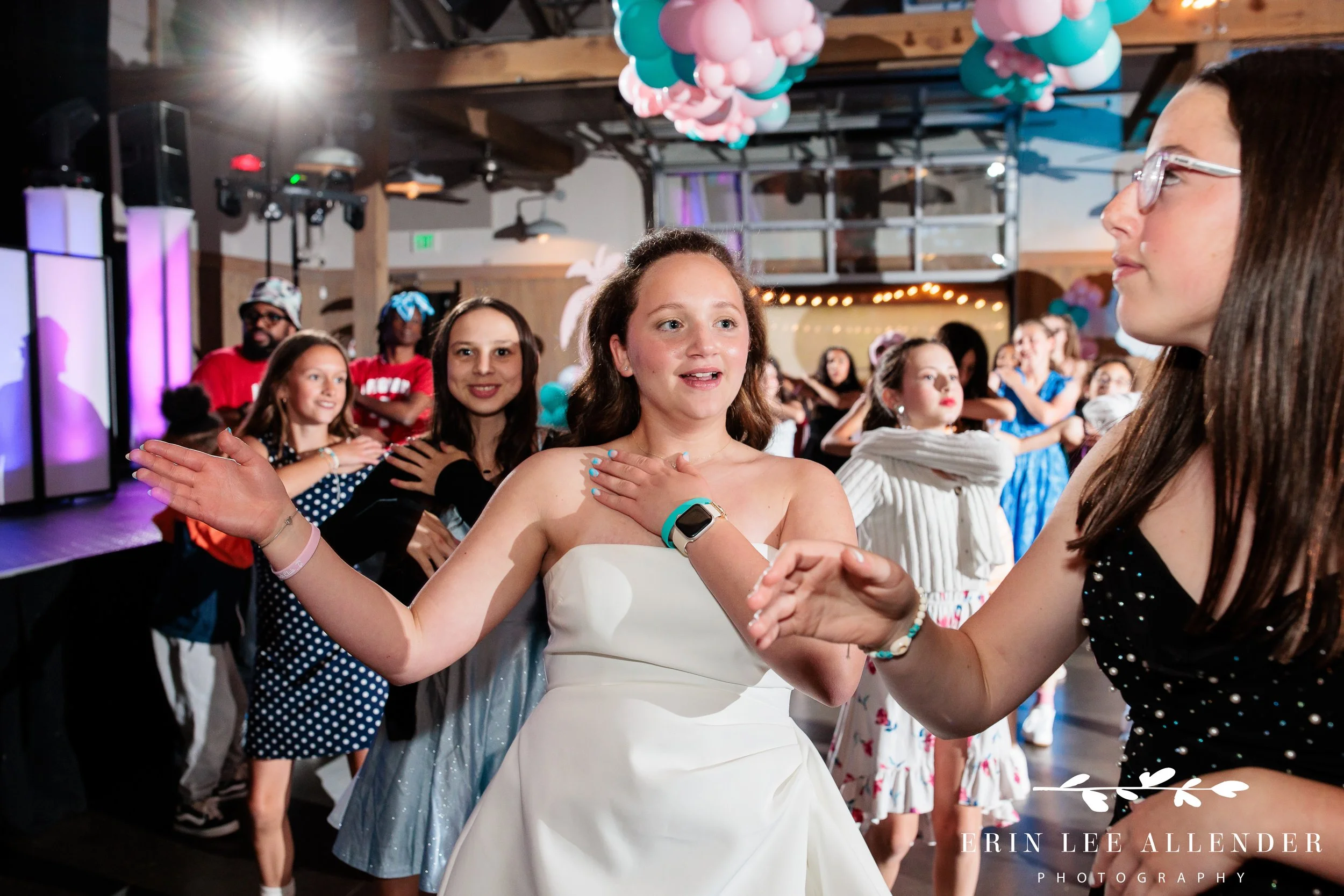 Nashville mitzvah photography — kids doing the Macarena on the dance floor at Loveless Barn Nashville