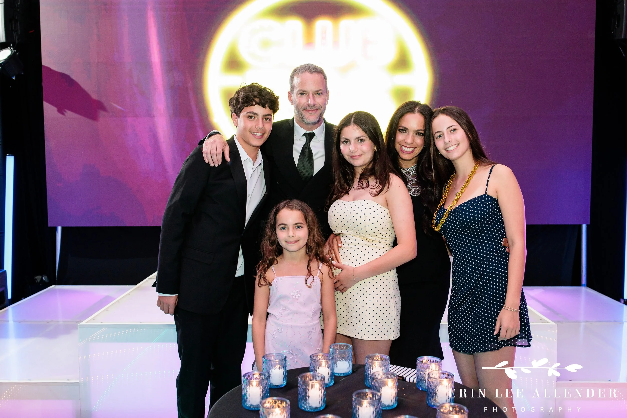 Family gathered during candle lighting moment