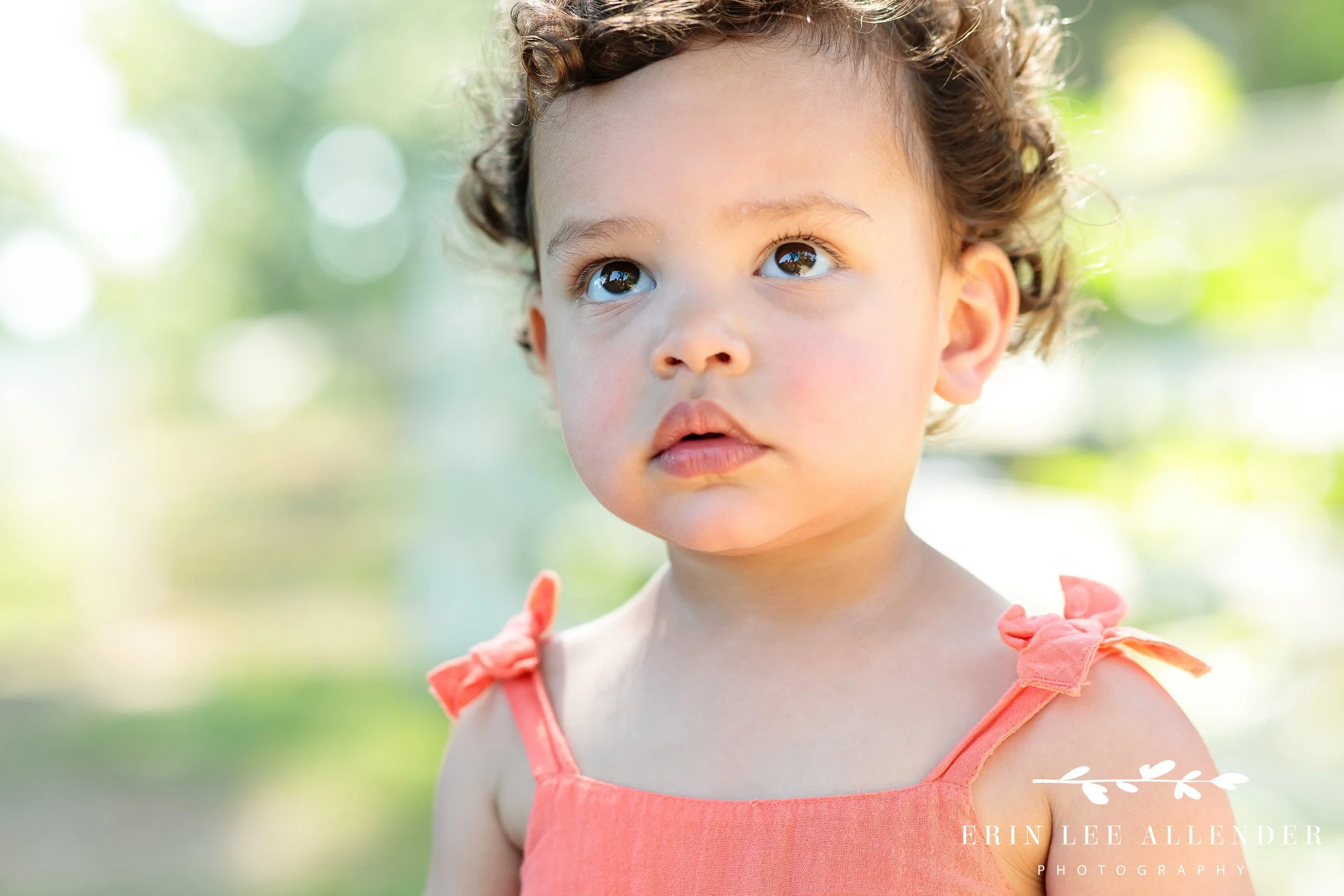 Nashville family session — two-year-old girl in a peach sundress at Ellington Agricultural Center