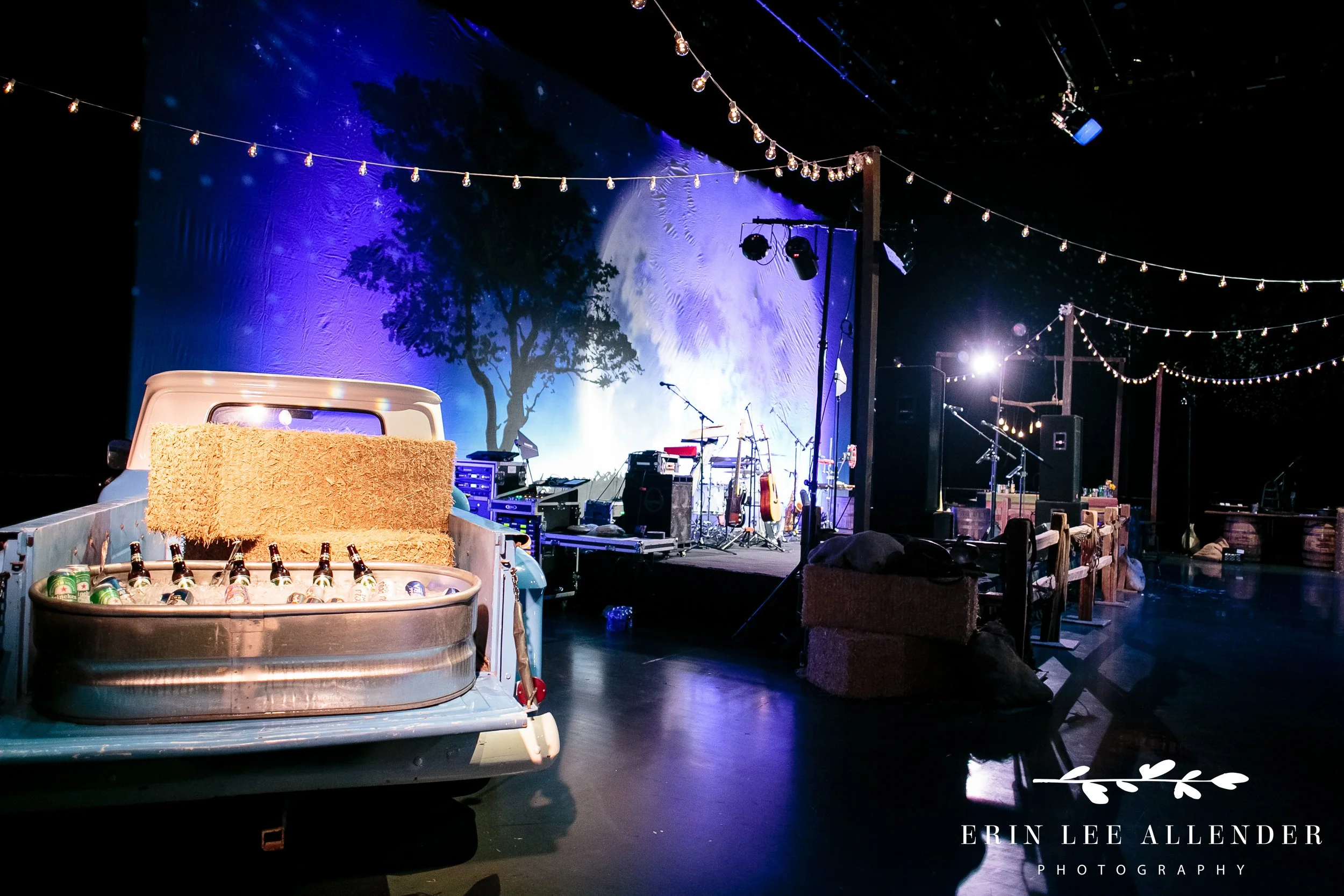 Nighttime event design with truck bar and café lights on Grand Ole Opry stage Nashville