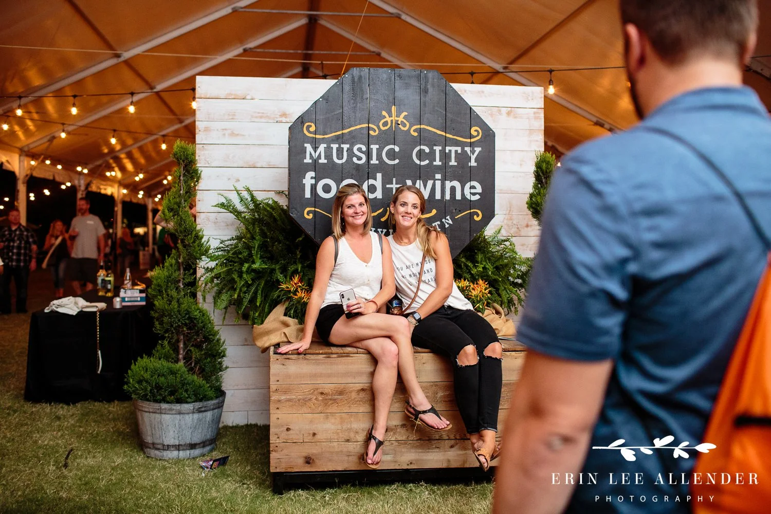 Festival guests getting their photo taken at a branded photo opportunity at the Music City Food and Wine Festival Nashville Tennessee