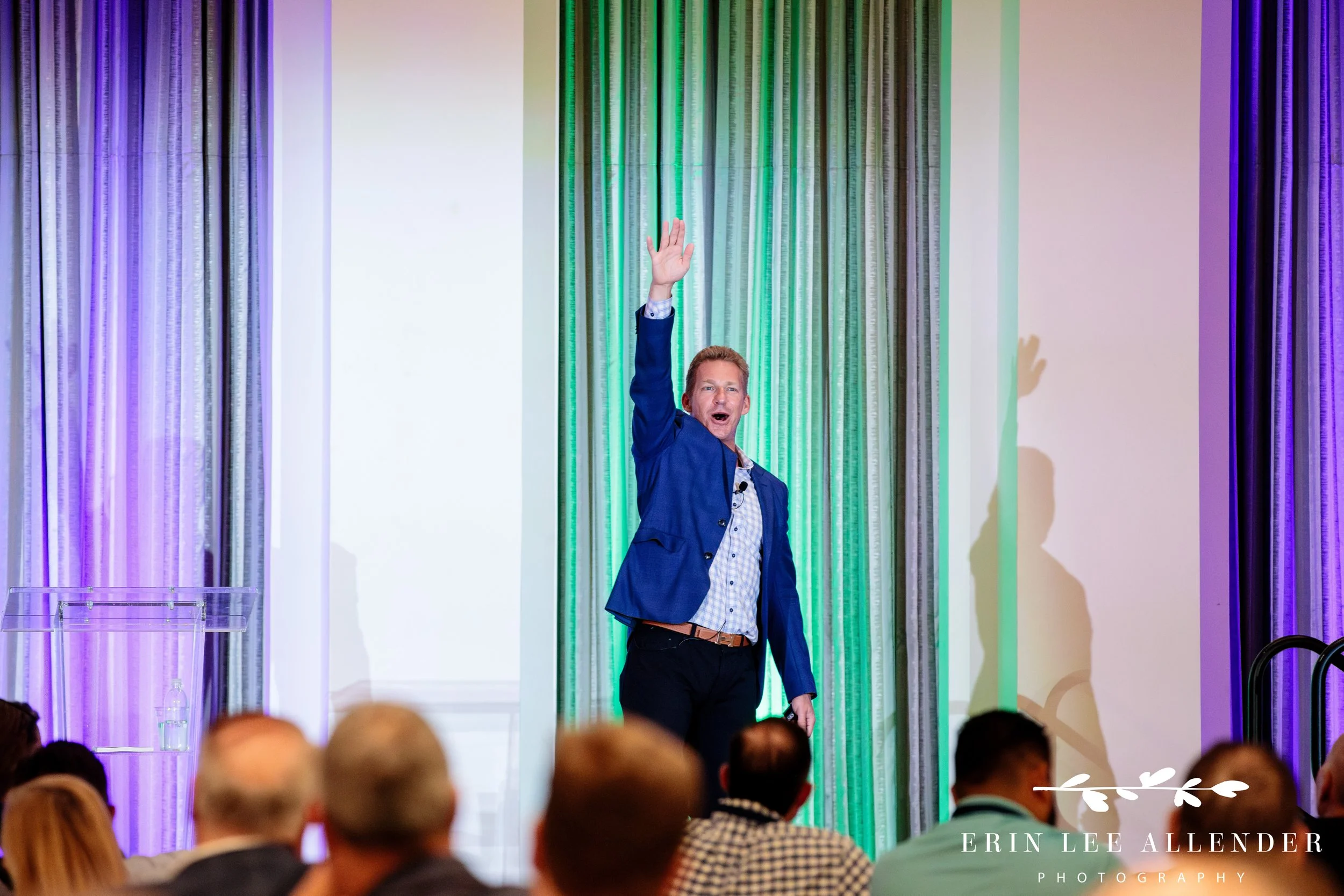 Nashville corporate event photography — guest speaker addressing attendees from the podium at CBIZ Nashville Summit at The Conrad