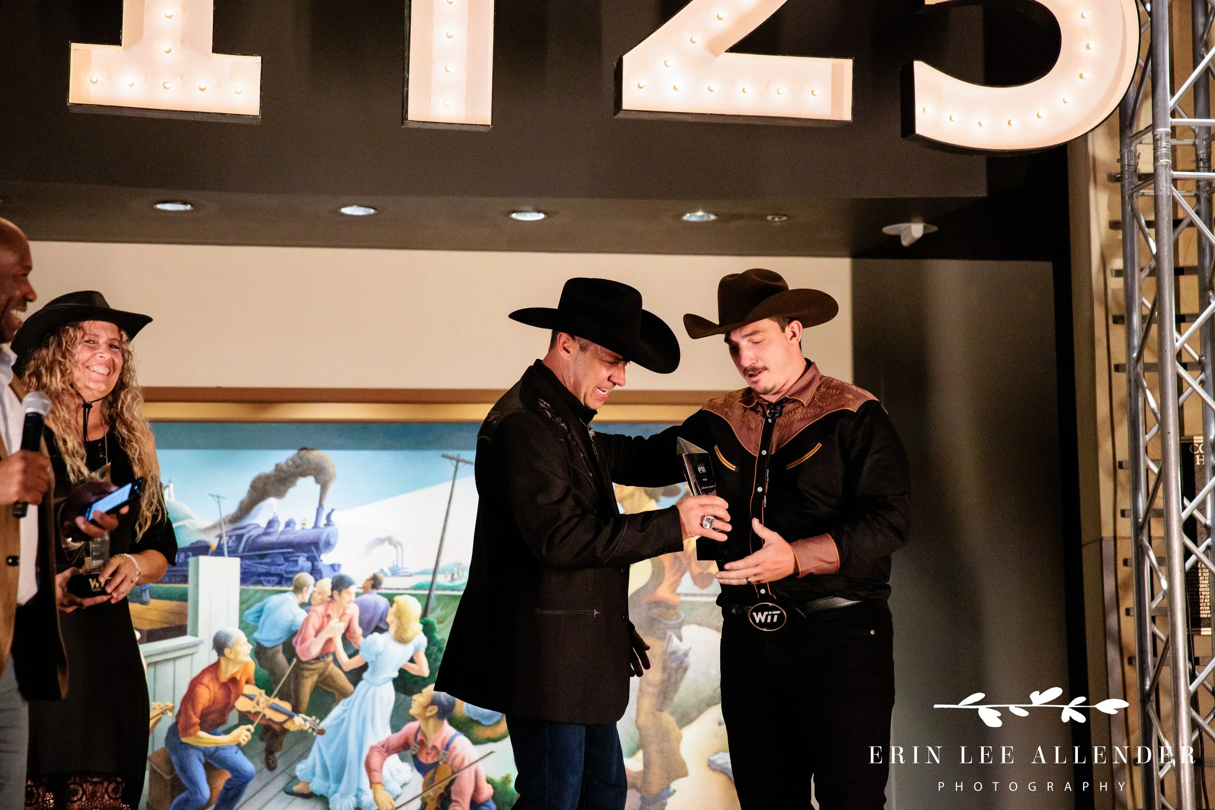 awards being handed at award ceremony at country music hall of fame