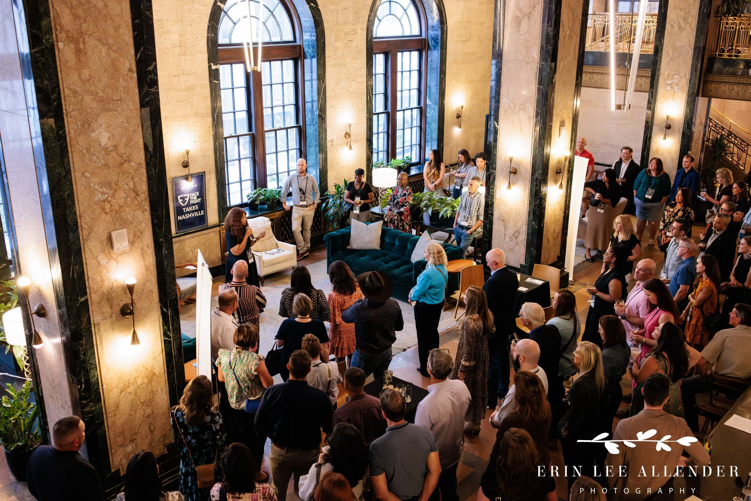 Nashville corporate event photography — Tiffany Freeman of Humana speaking to guests at Face the Fight's opening night at Noelle