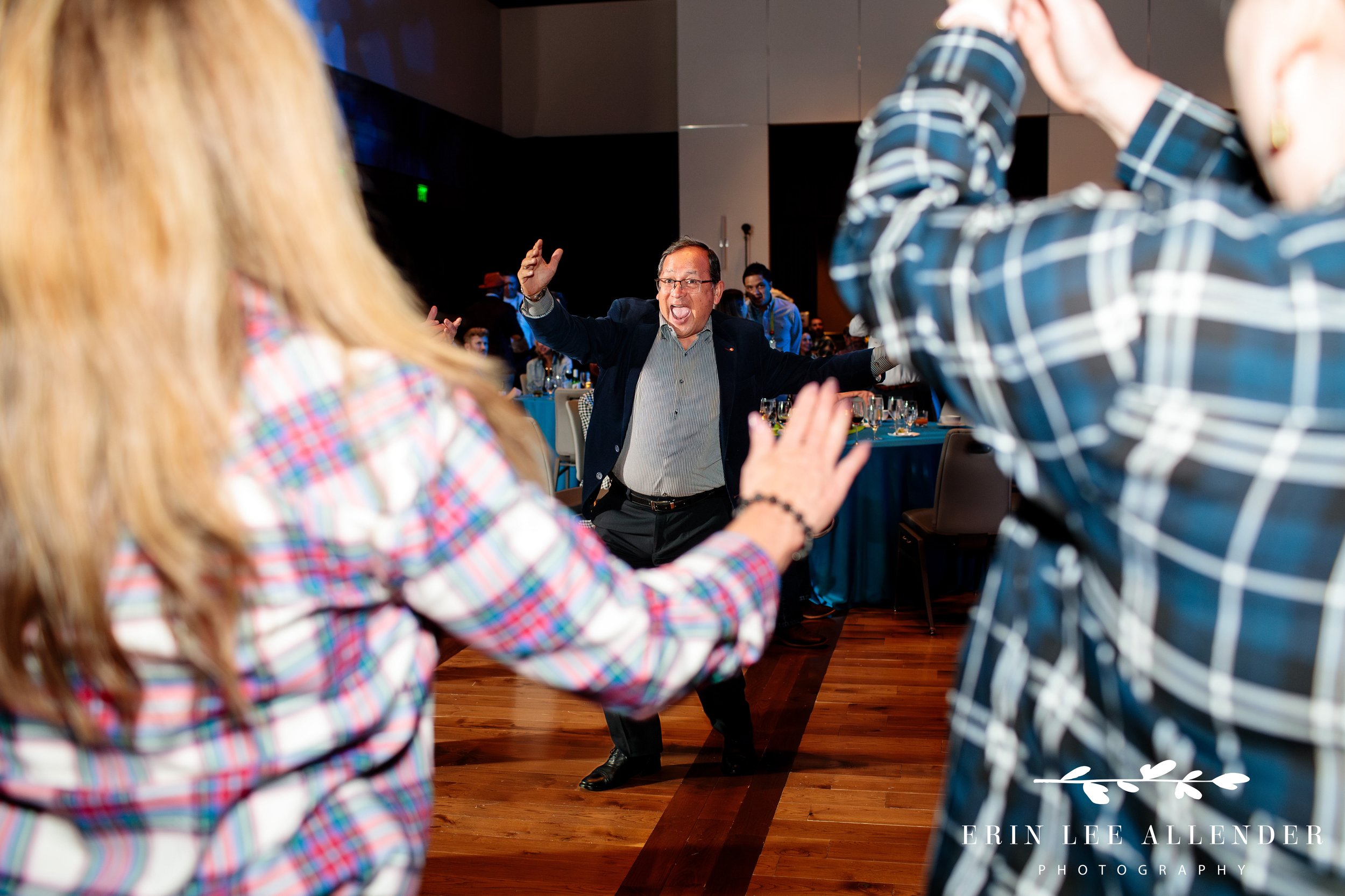 Conference guests dancing during live music at Country Music Hall of Fame opening night party