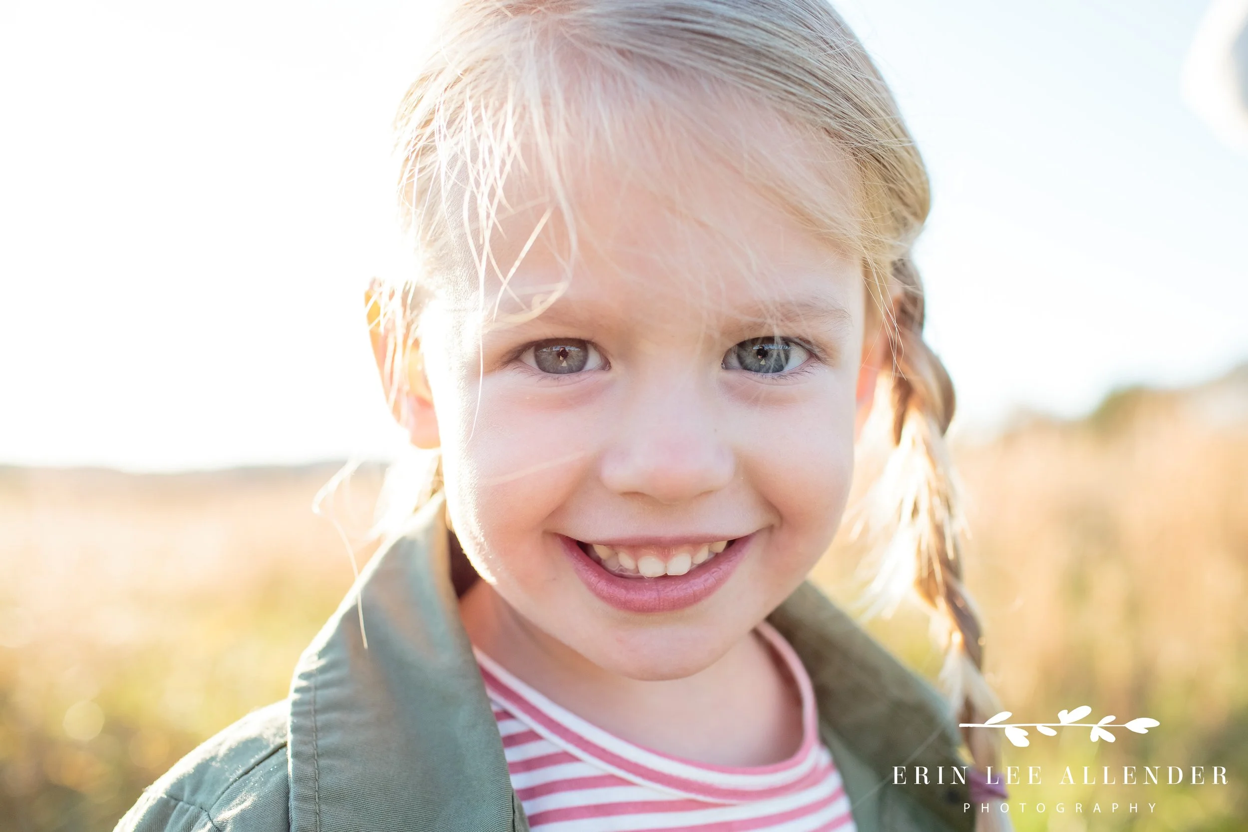 Close-up portrait of the children in golden hour sunlight in a Gallatin outdoor family session.