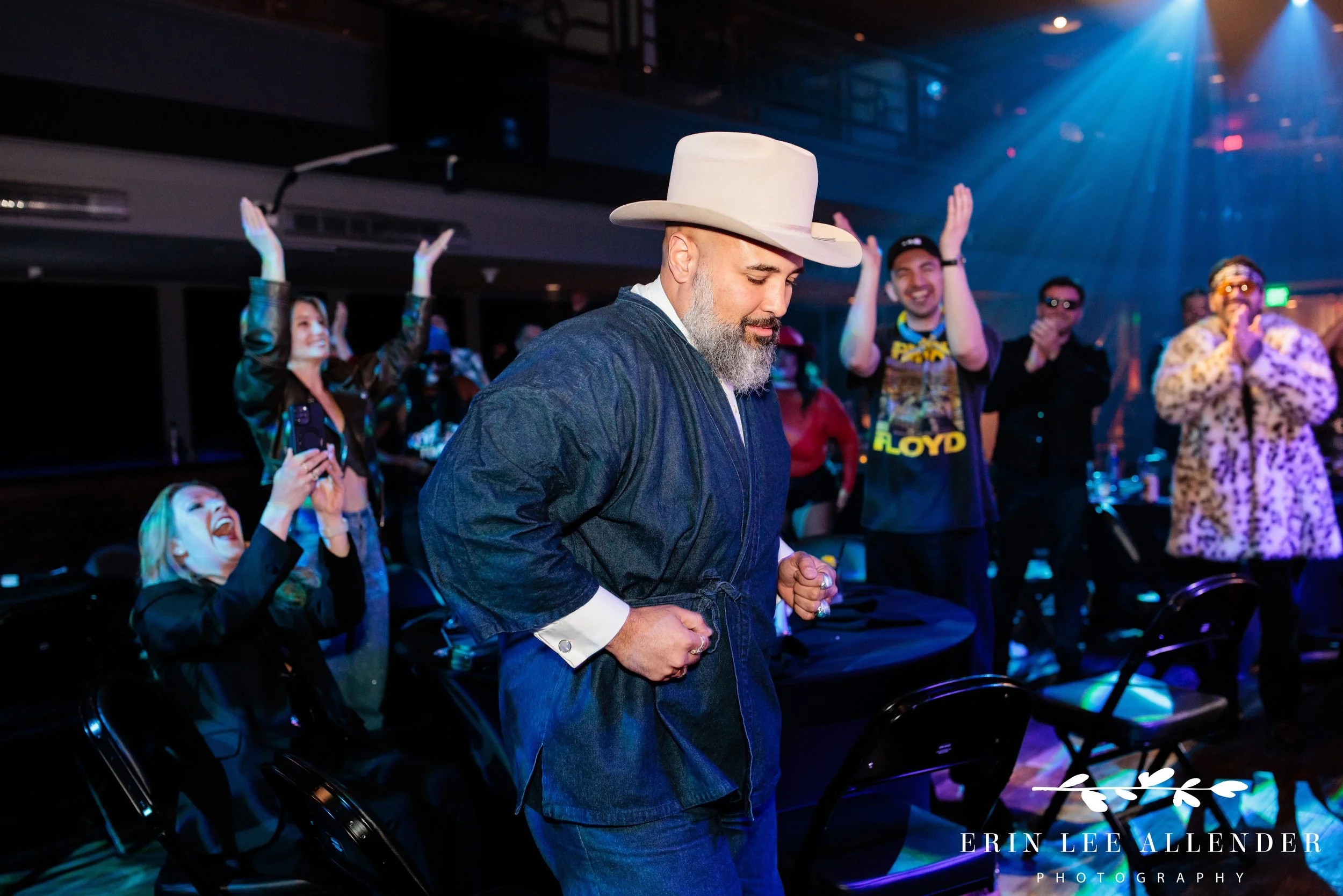 Nashville corporate event photography — advocacy award winner dancing on way to stage, Woolworth Theatre Nashville