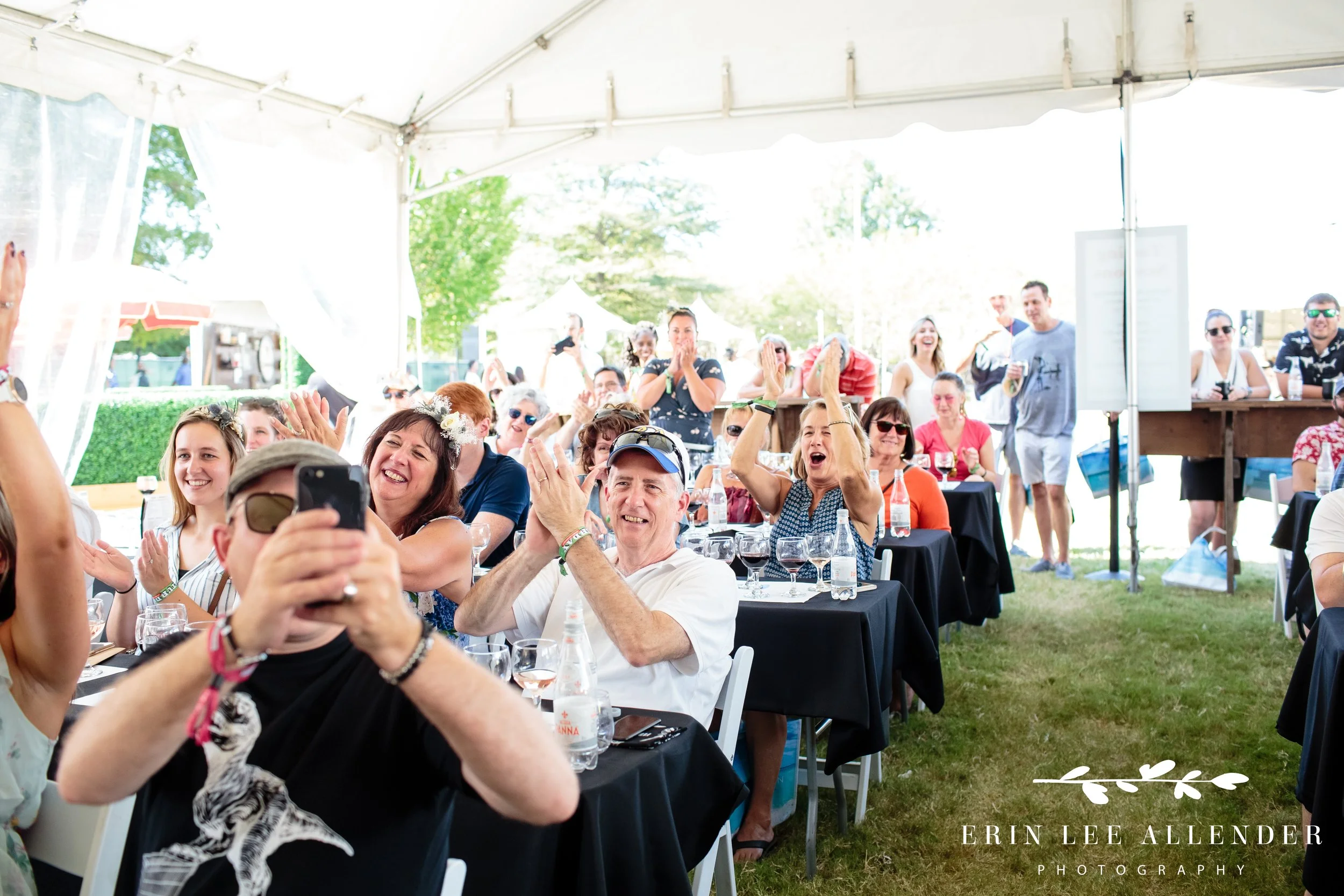 Crowd reacting to champagne sabering at the Music City Food and Wine Festival Nashville Tennessee