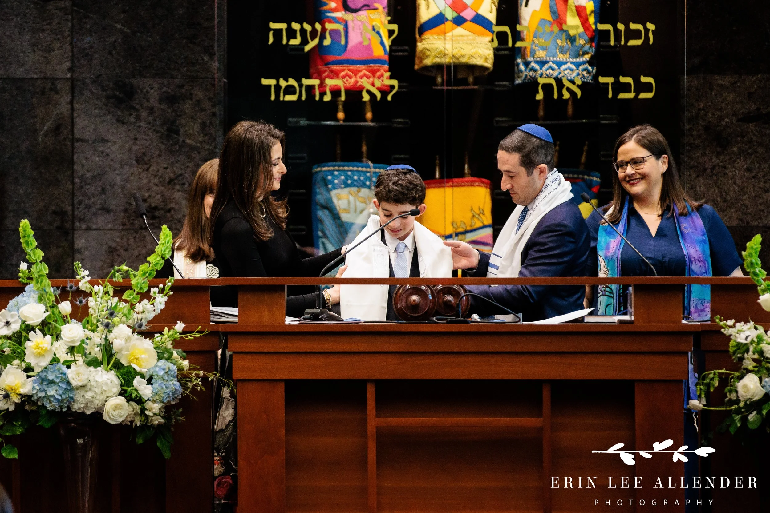 Parents presenting tallit to bar mitzvah at The Temple in Nashville