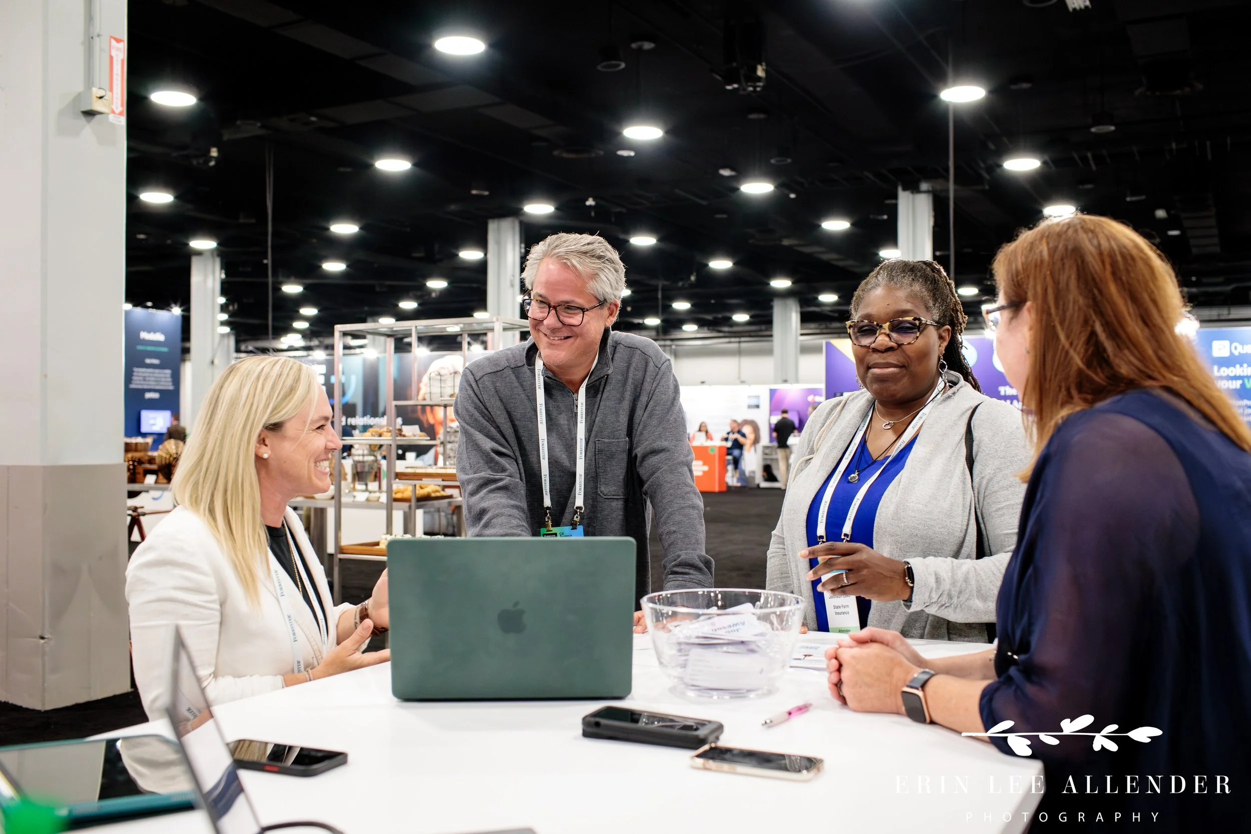 Networking between attendees and exhibitors in marketplace during corporate CX conference at Gaylord Opryland Hotel