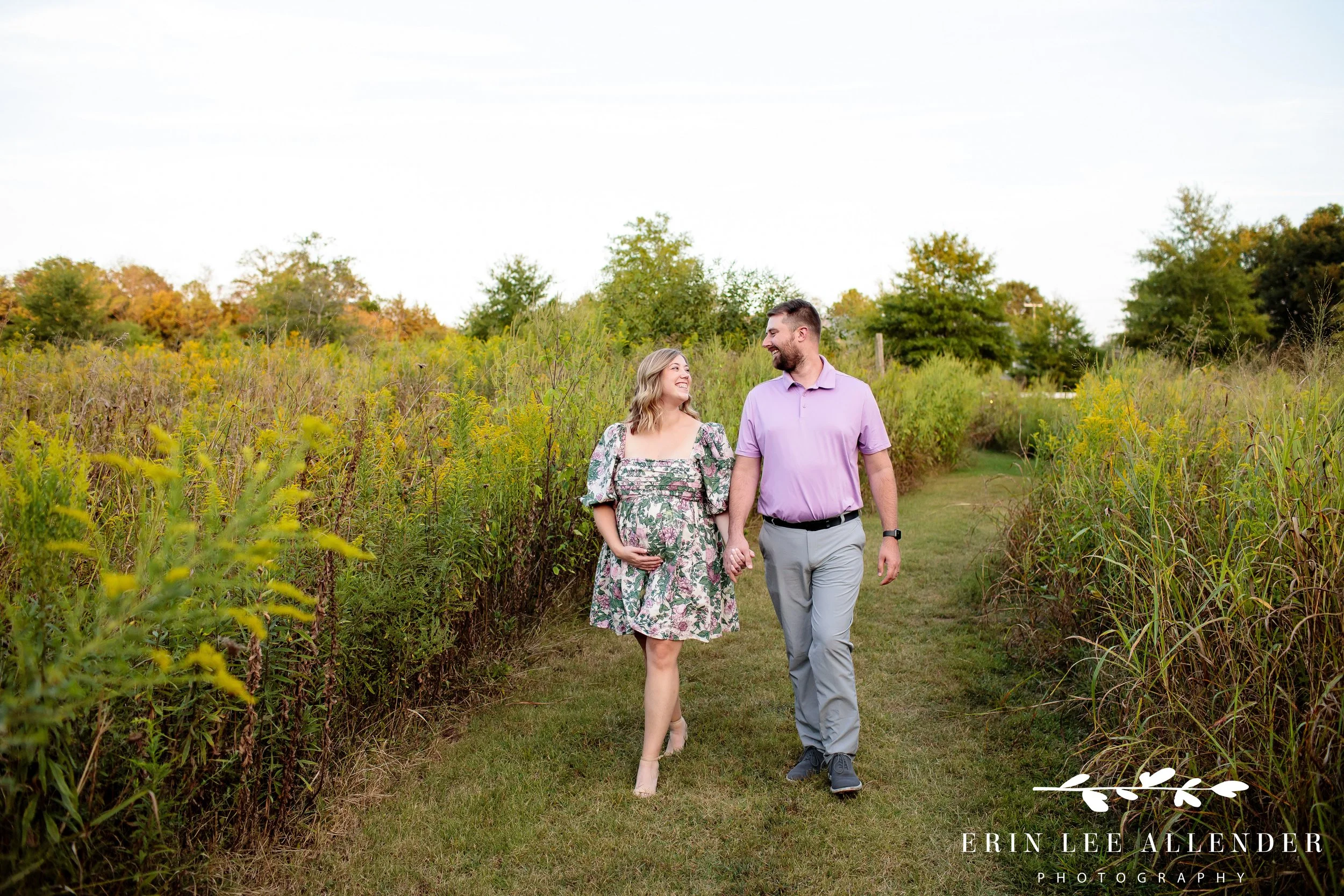 Couple walking together at Long Hollow Gardens during golden hour maternity session, Gallatin, Tennessee, photographed by Nashville family photographer Erin Lee Allender